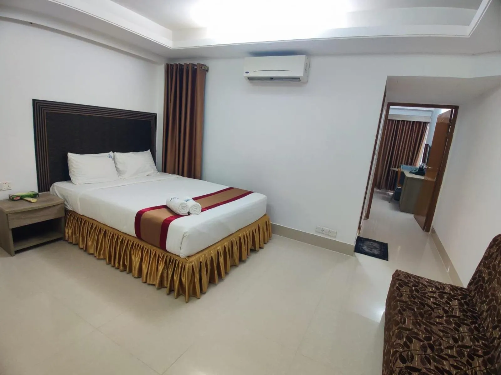 Bed in Cox West Inn