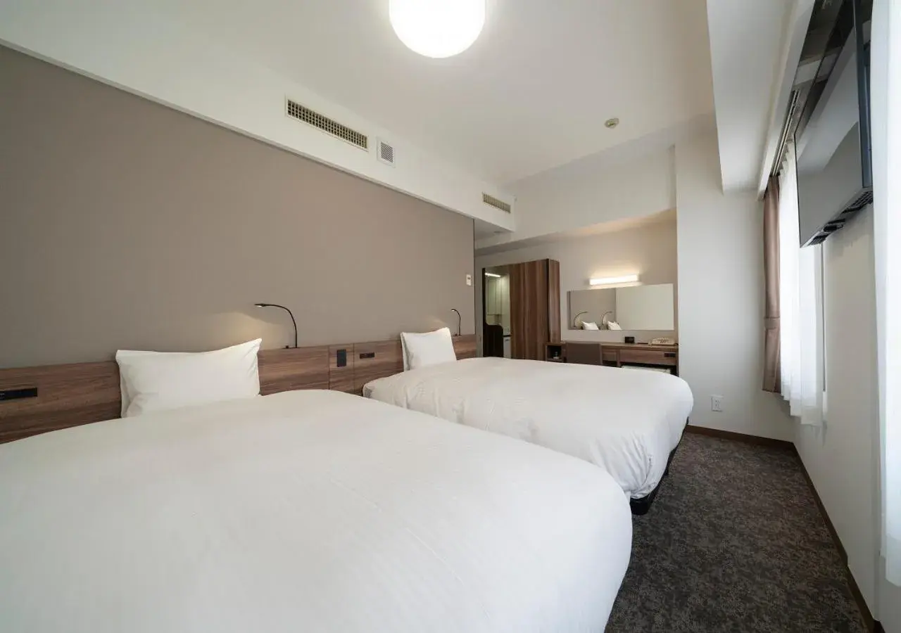 Bed in Nagoya B's Hotel Bed in Nagoya B's Hotel