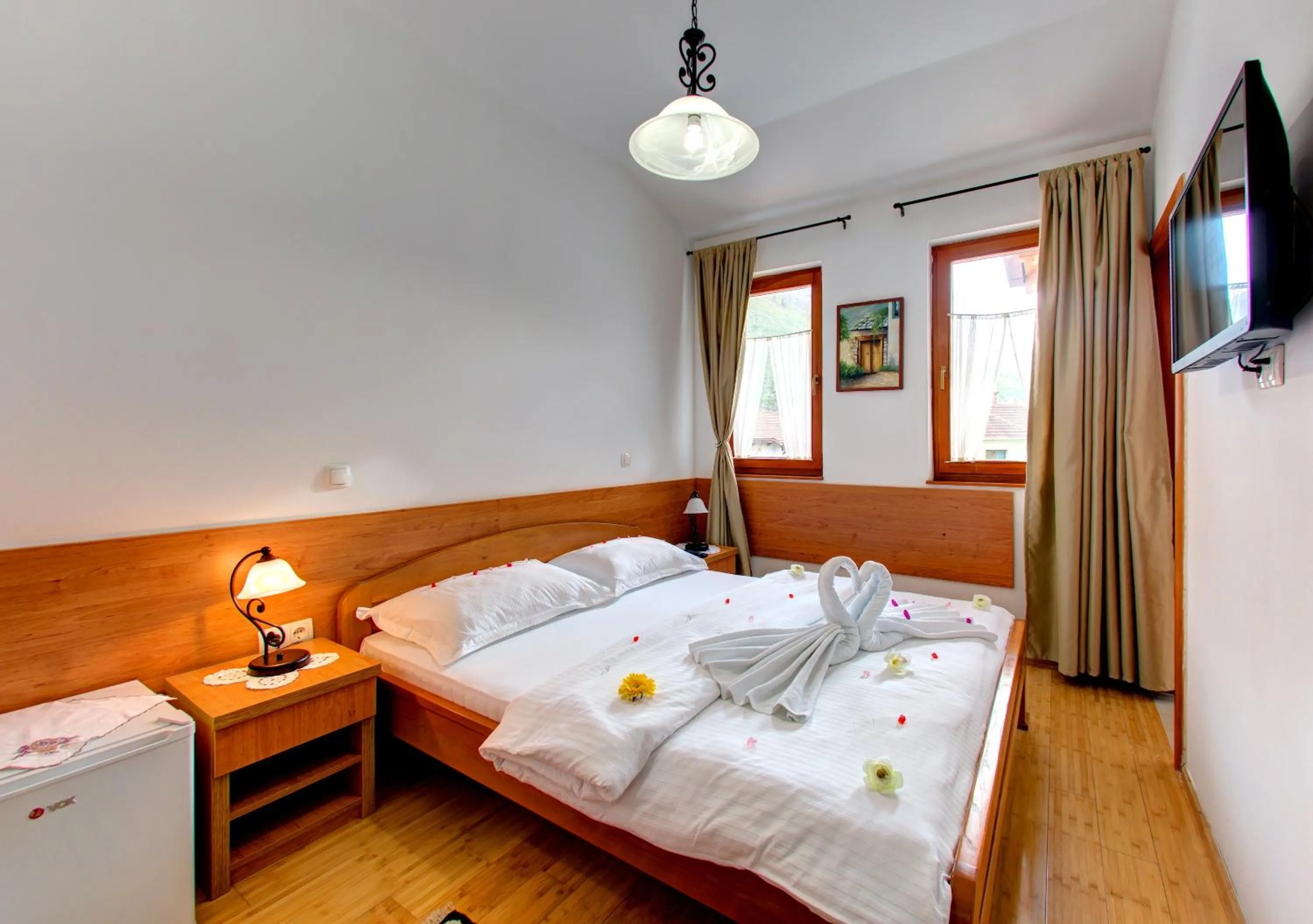 Communal lounge/ TV room, Bed in Hotel Almira