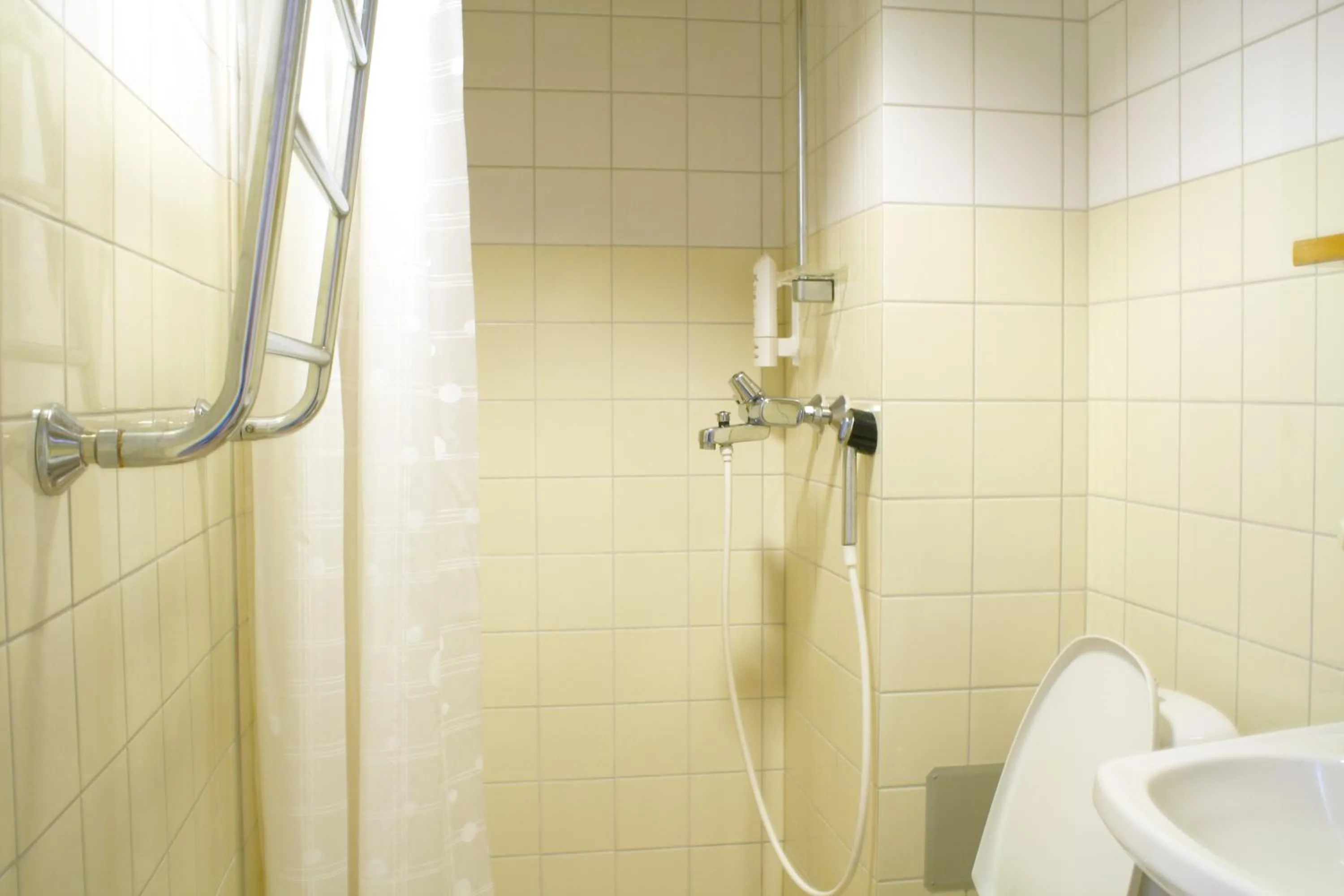 Shower in Hotelli Joentalo