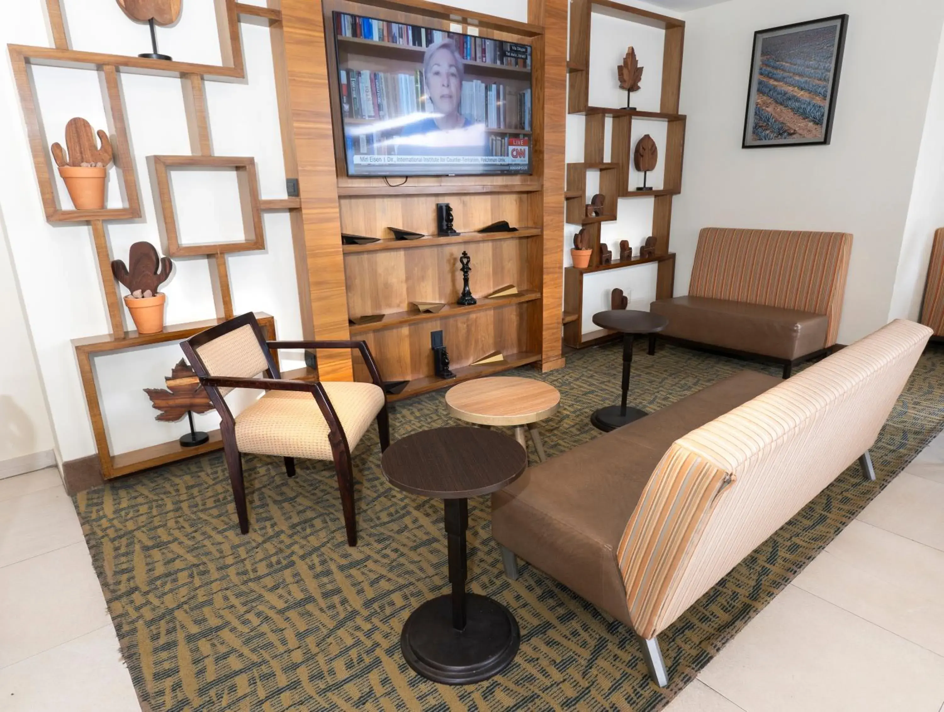 Living room in Holiday Inn Express Guadalajara Aeropuerto by IHG Living room in Holiday Inn Express Guadalajara Aeropuerto by IHG