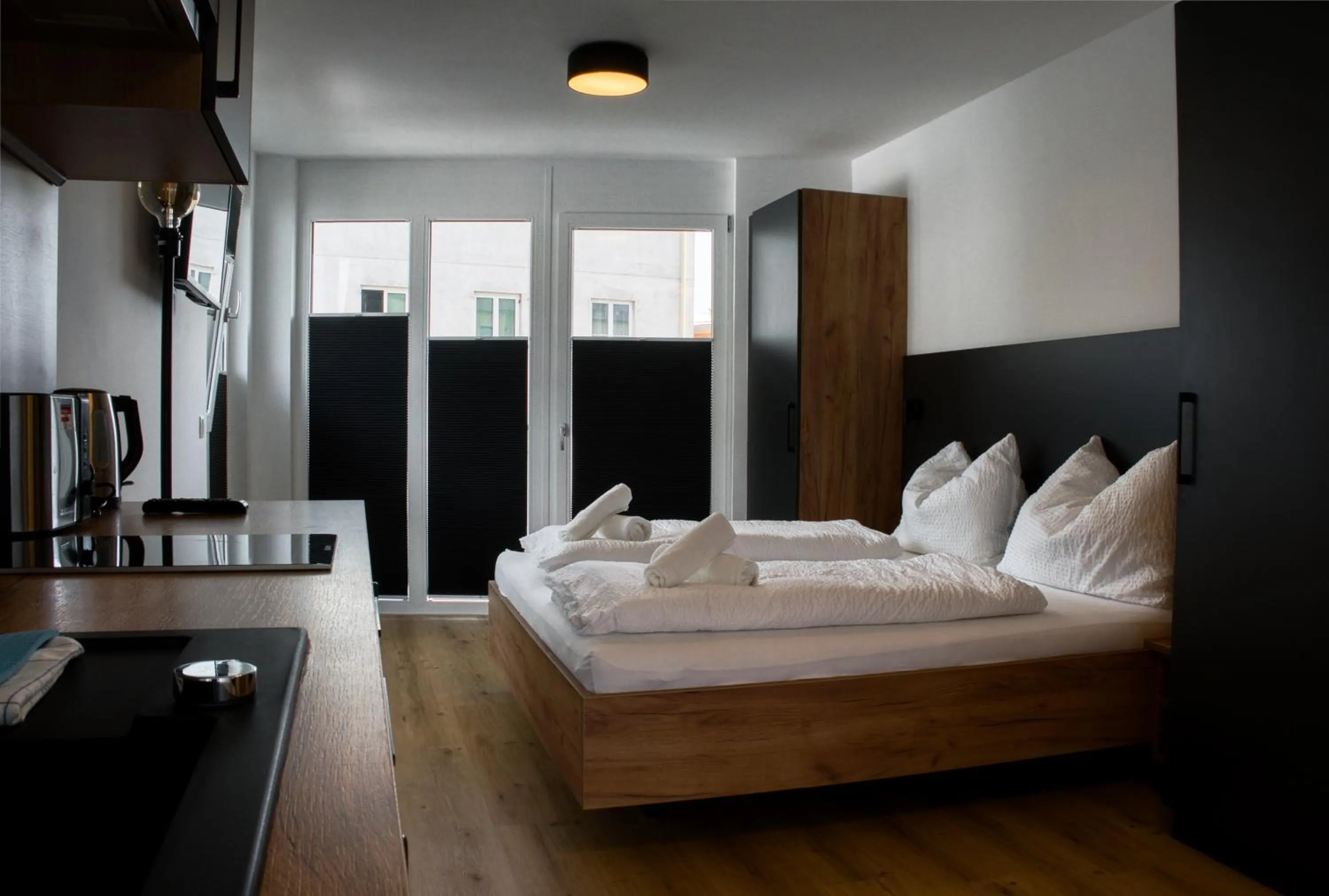 Bed in myQuartier City Chalets digital self check in