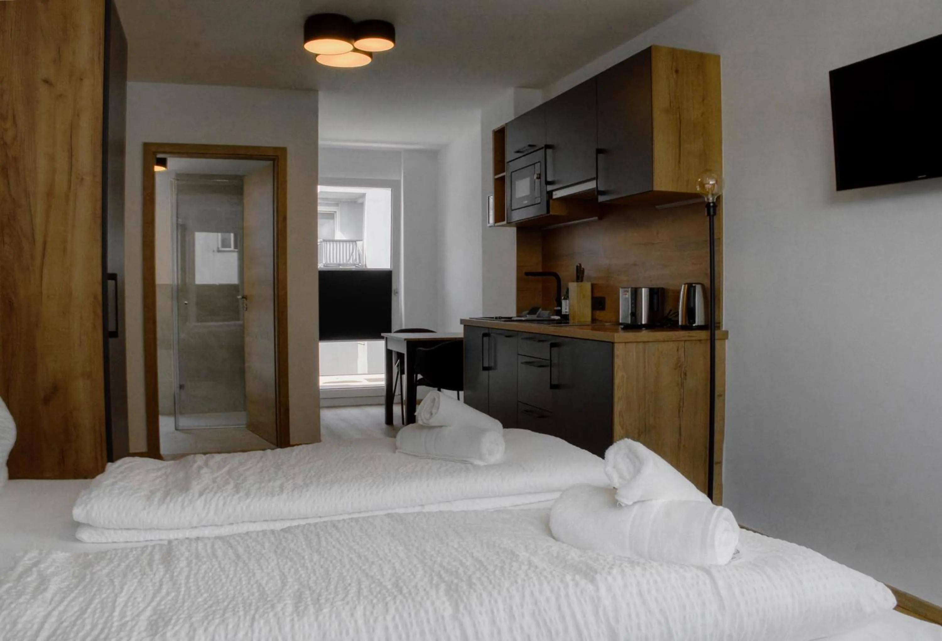 Bed in myQuartier City Chalets digital self check in