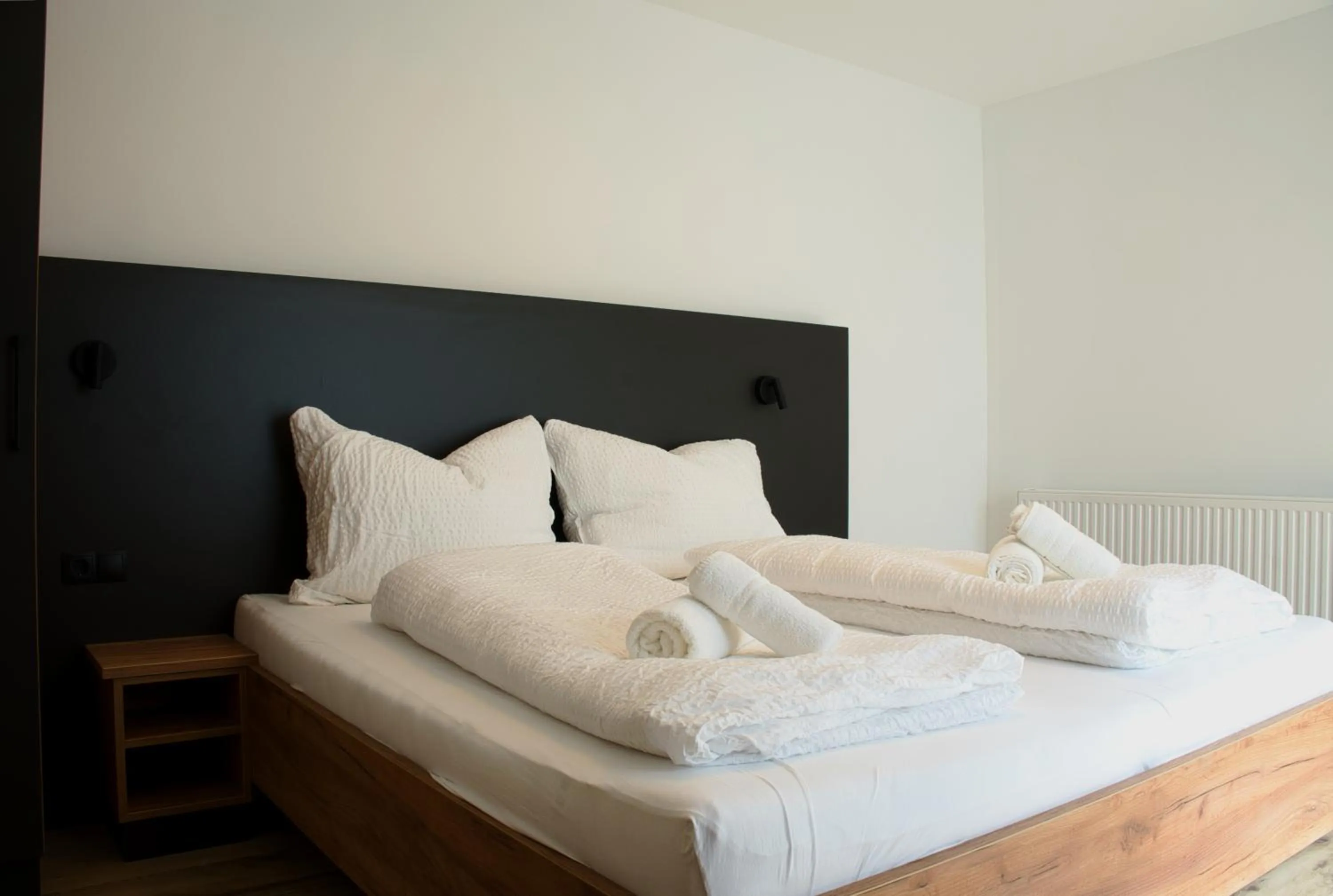 Bed in myQuartier City Chalets digital self check in