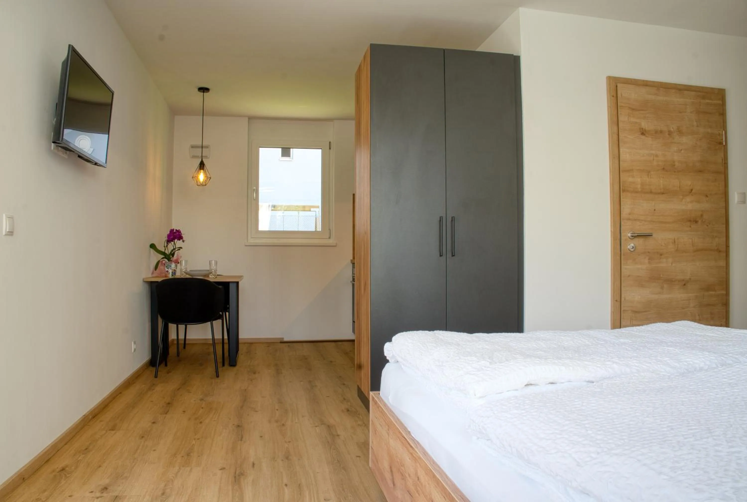 Bed in myQuartier City Chalets digital self check in