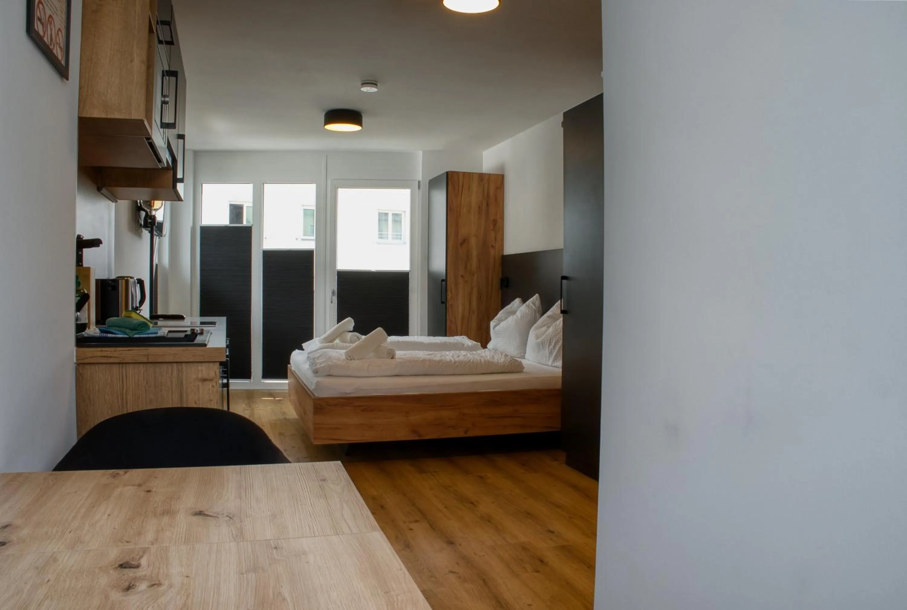 Bed in myQuartier City Chalets digital self check in