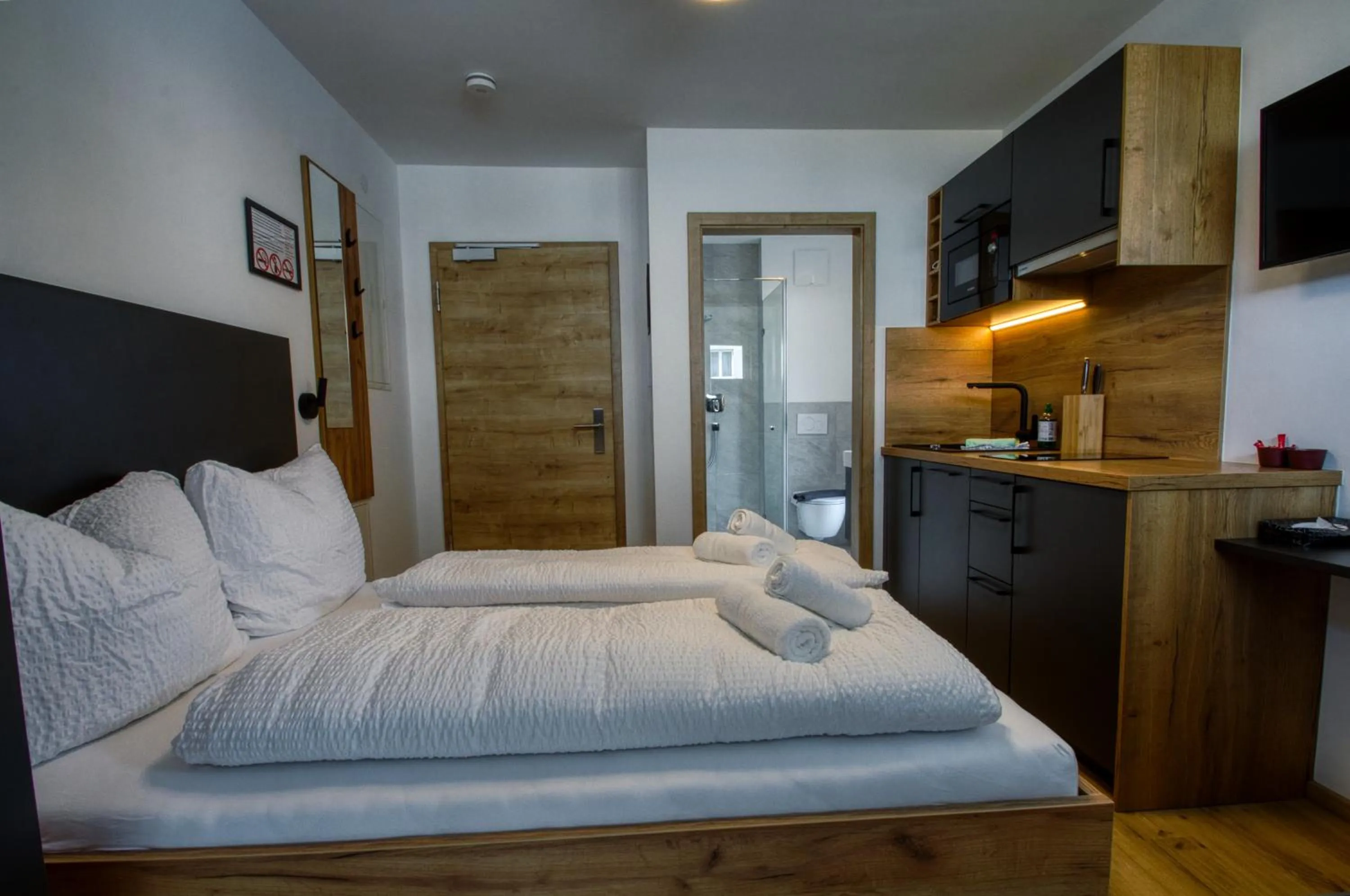 Bed in myQuartier City Chalets digital self check in