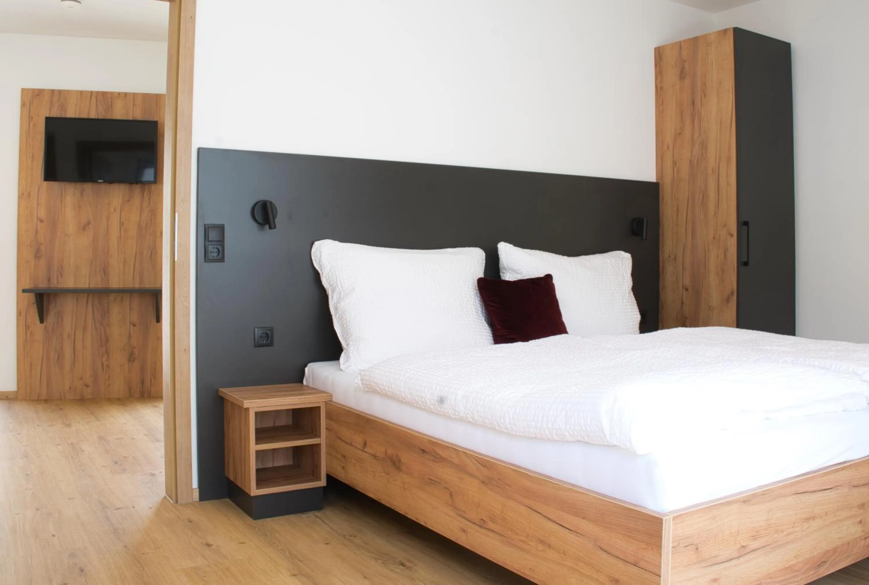 Bed in myQuartier City Chalets digital self check in