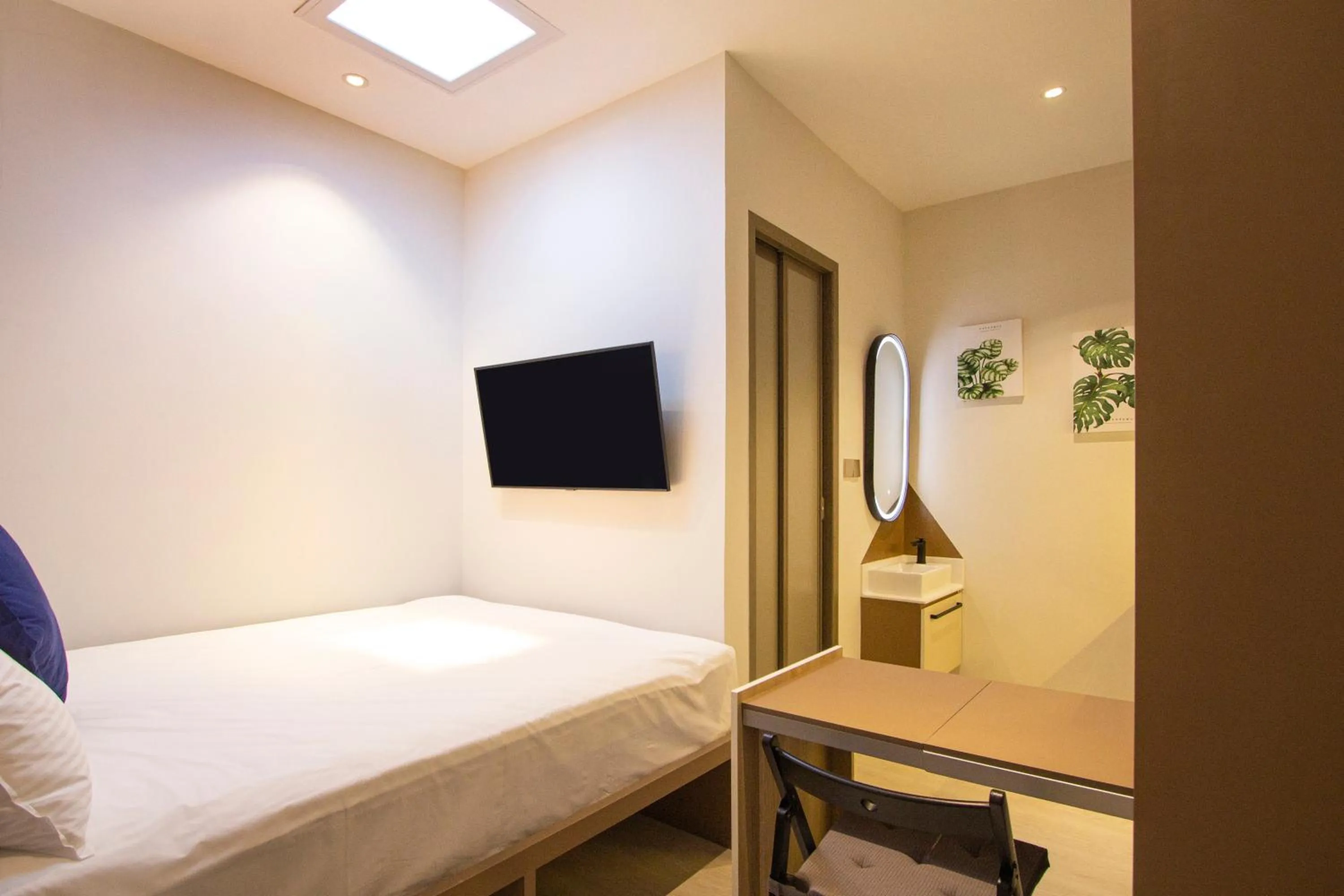 Bedroom, Bed in Habyt Studios at Novena