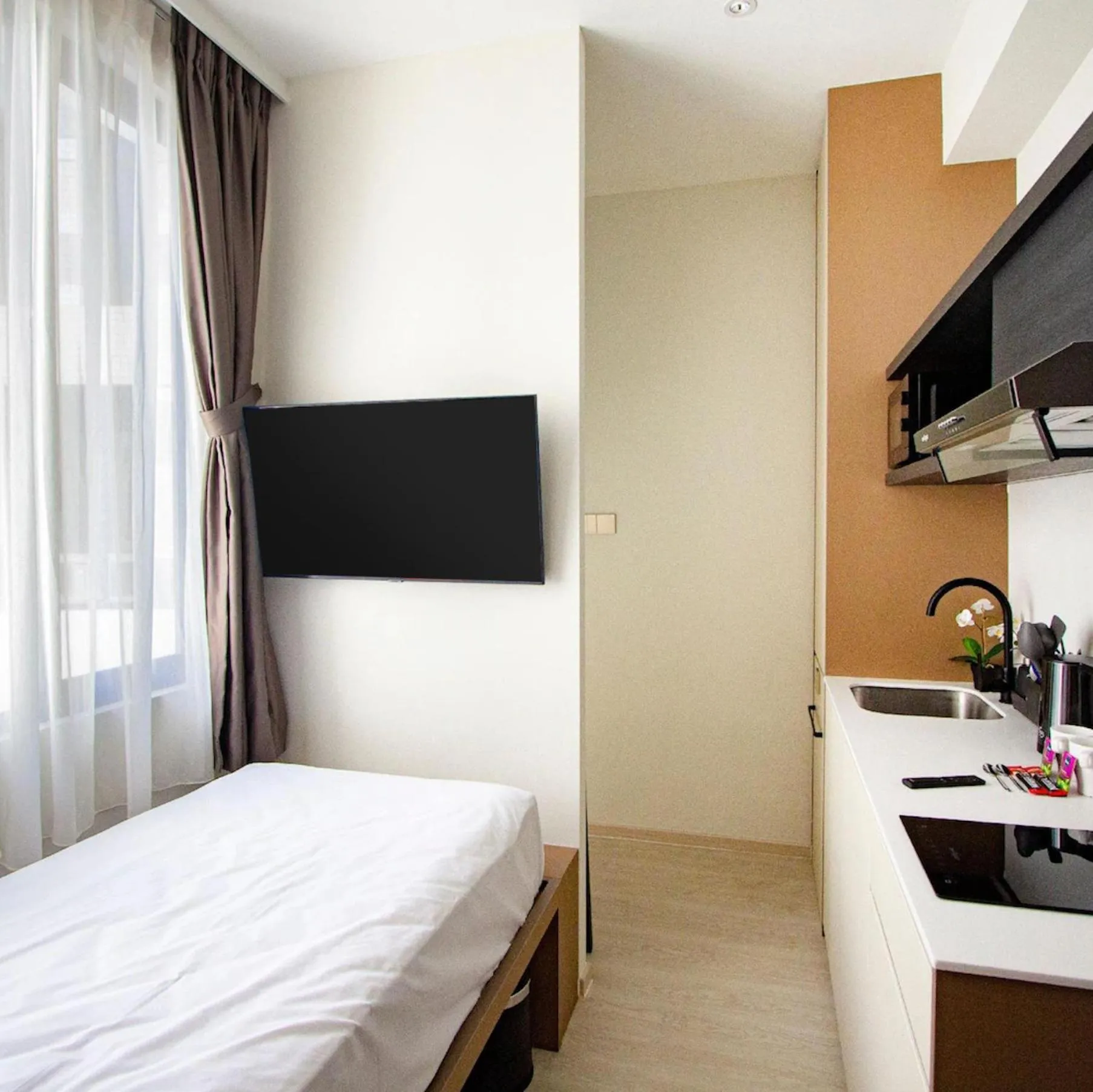 Kitchen or kitchenette, Bed in Habyt Studios at Novena