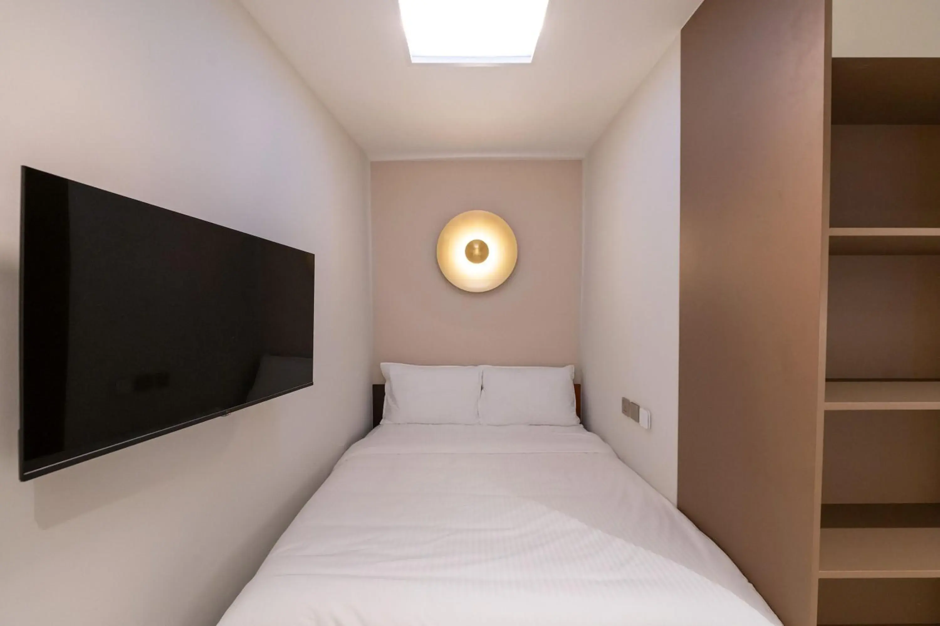 Bed in Habyt Studios at Novena Bed in Habyt Studios at Novena