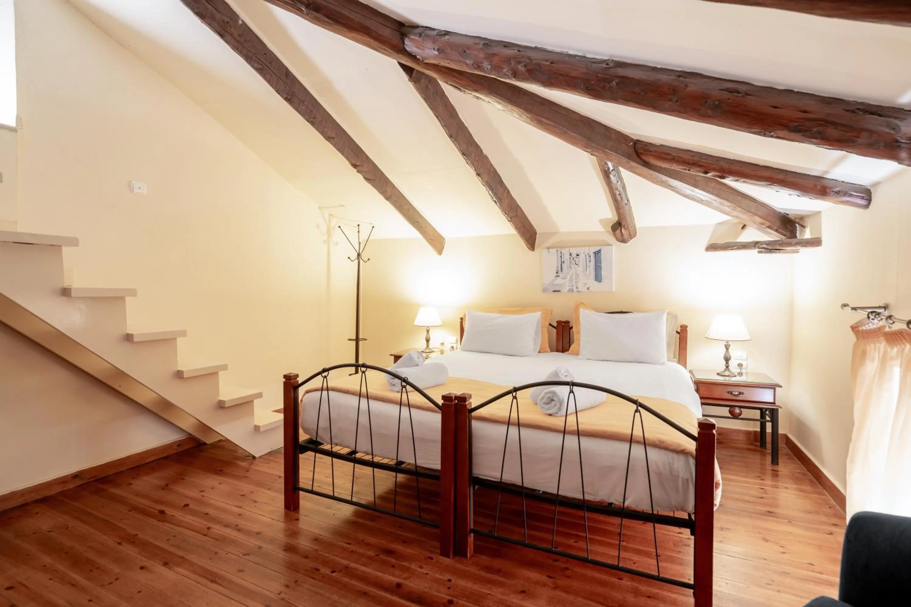 Bed in Archontiko Eleni Hotel