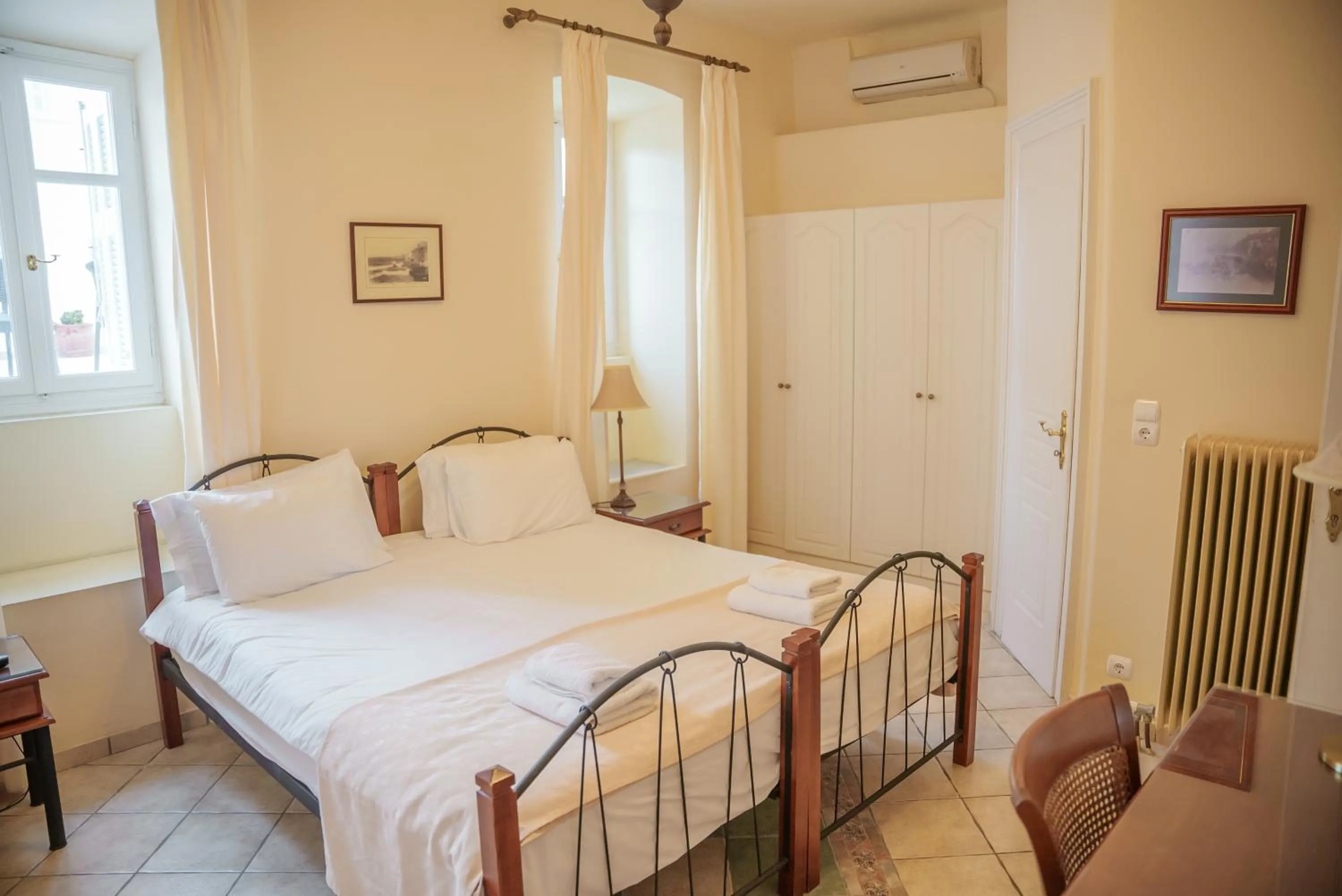 Bed in Archontiko Eleni Hotel