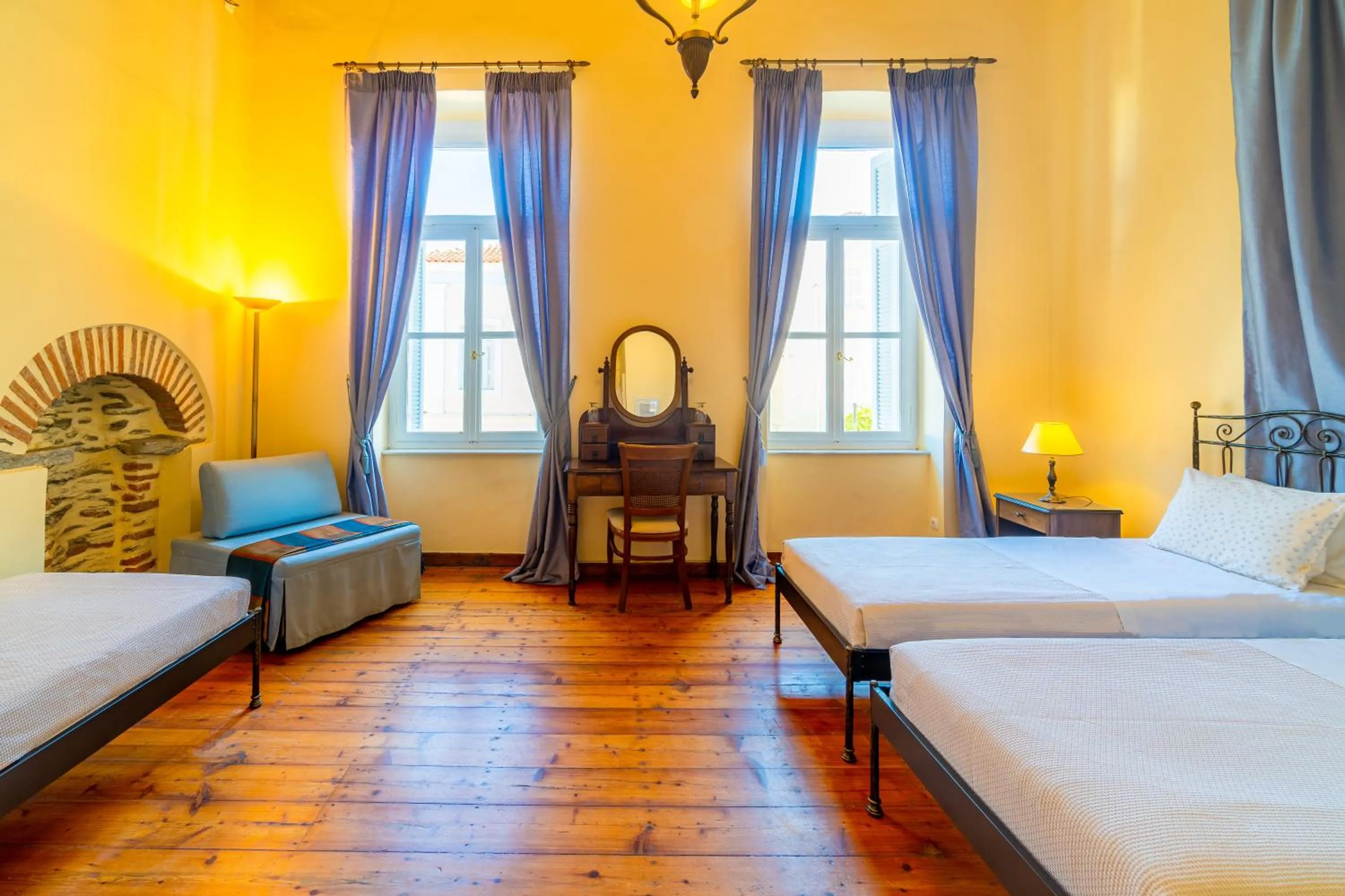 Bed in Archontiko Eleni Hotel