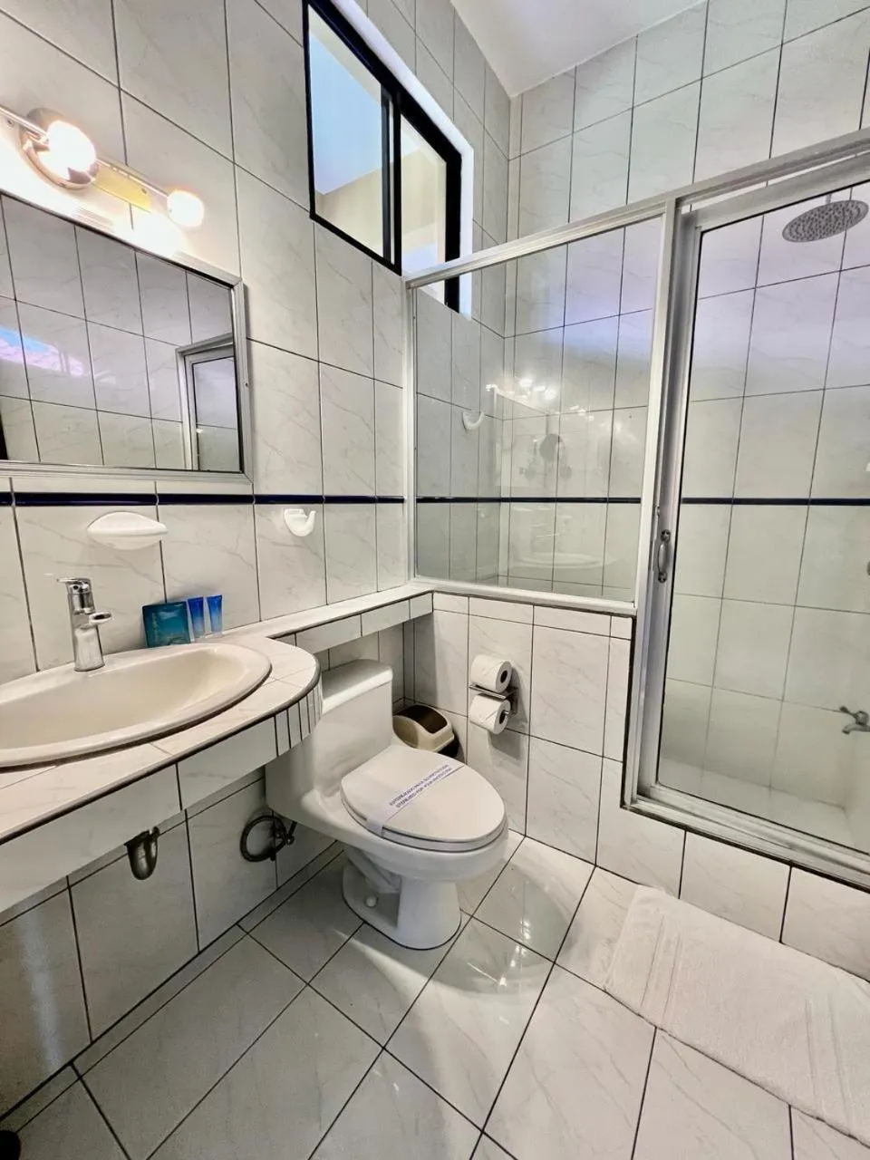 Bathroom in The Backyard Beachfront Hotel