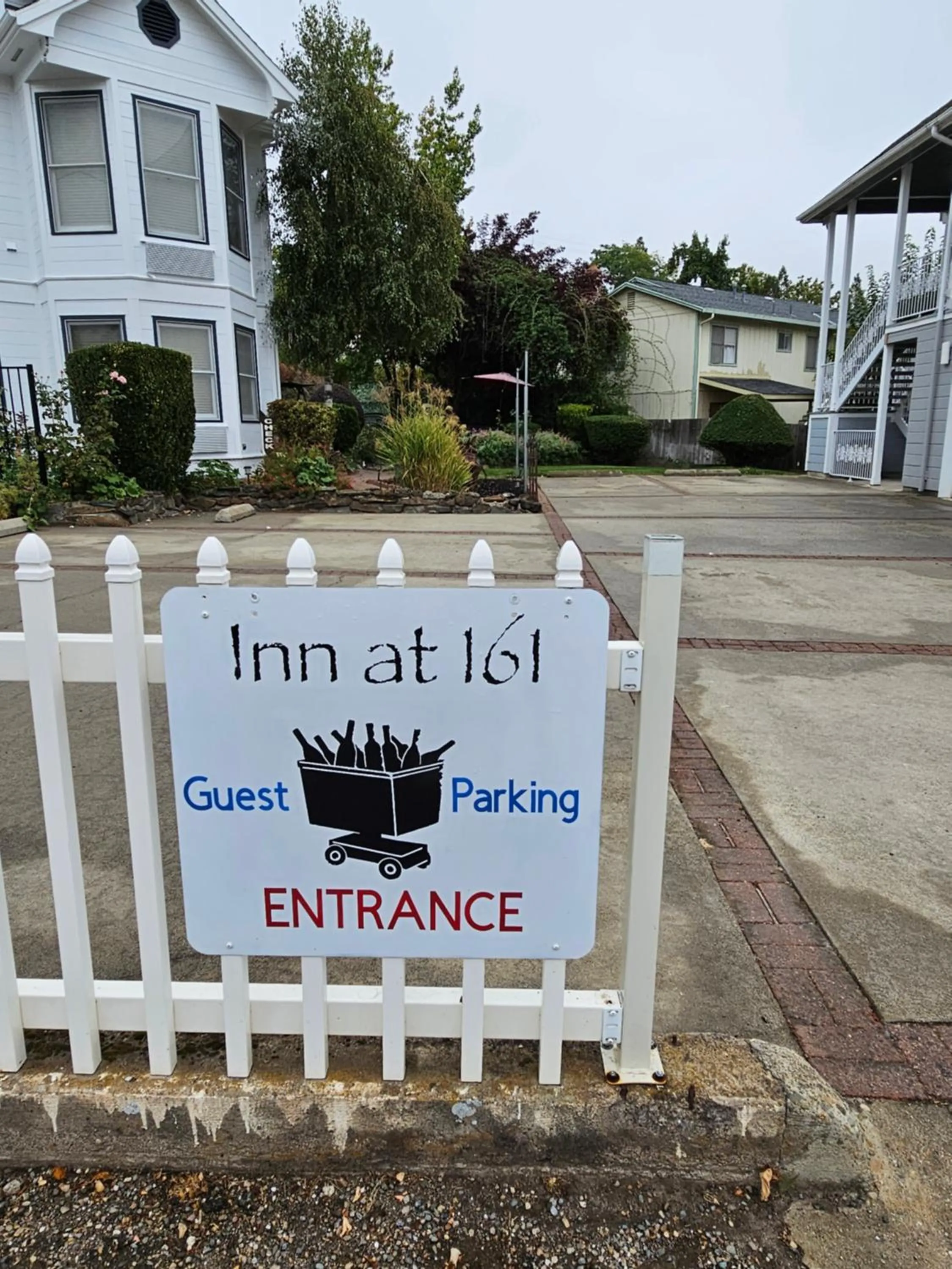 Property logo or sign in The Inn at 161