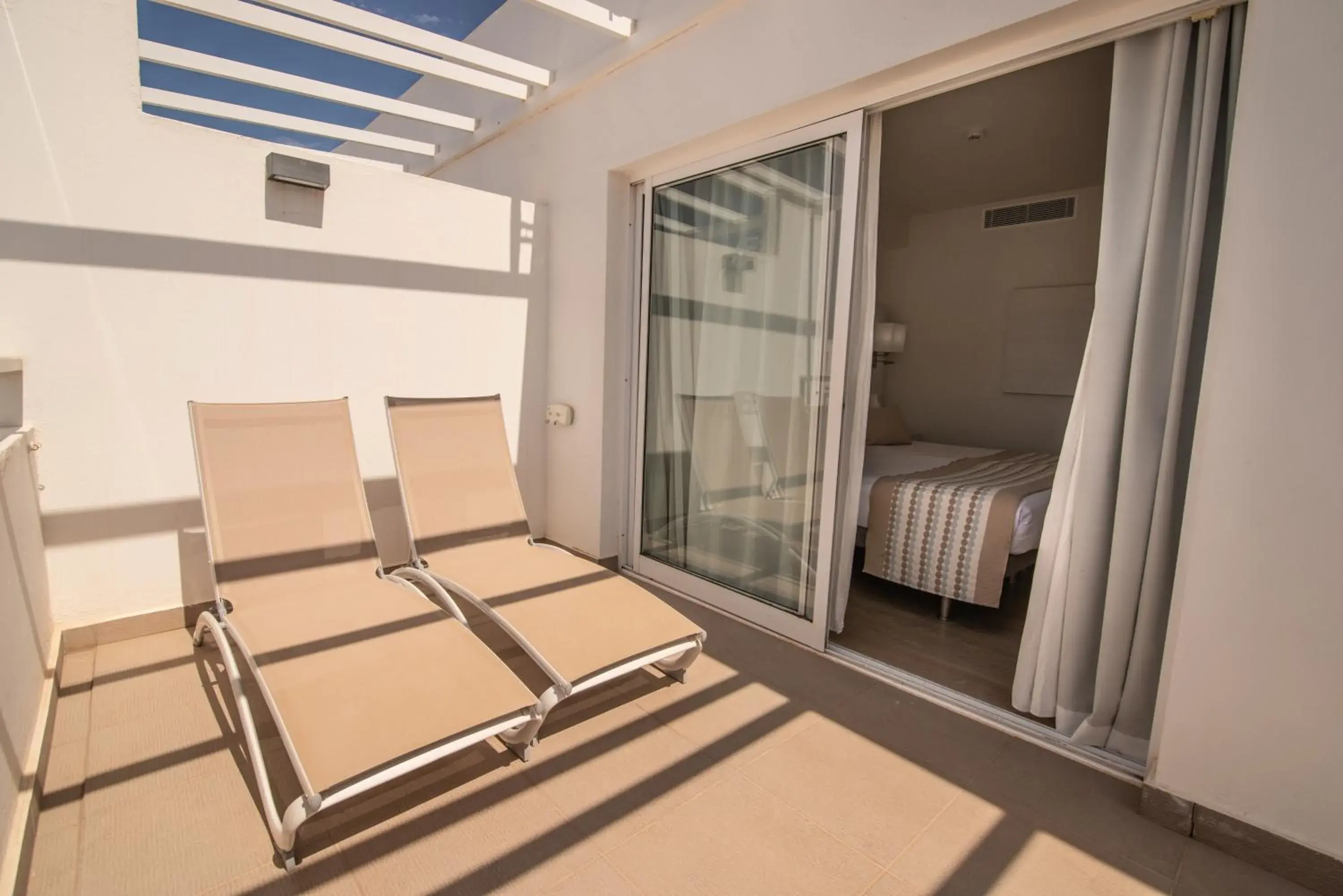 Balcony/Terrace, Bed in Aequora Lanzarote Suites Balcony/Terrace, Bed in Aequora Lanzarote Suites