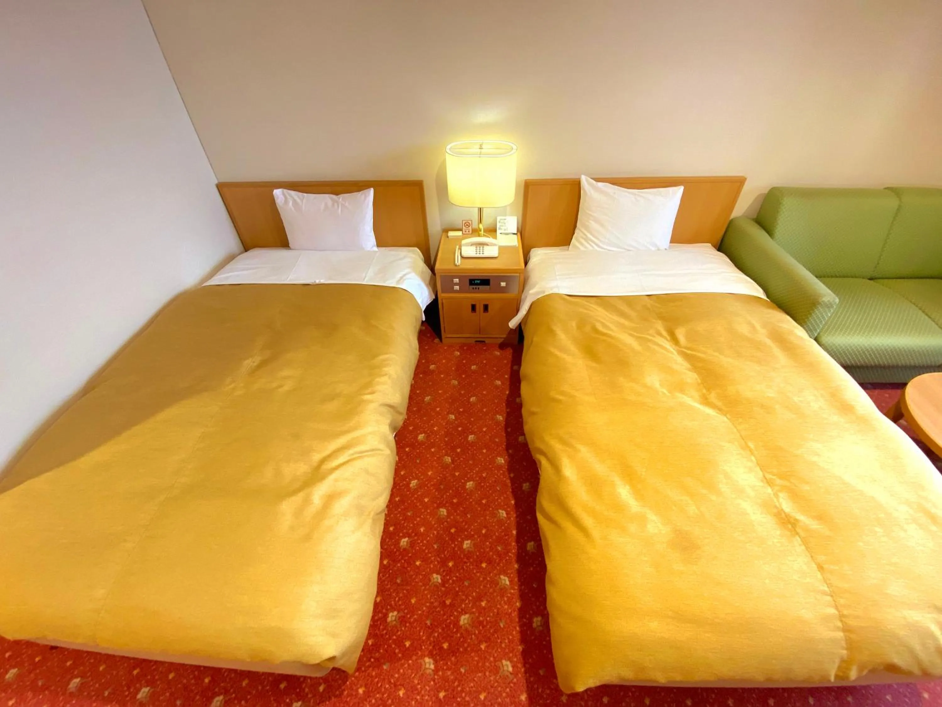 Bed in Hotel Lavenir