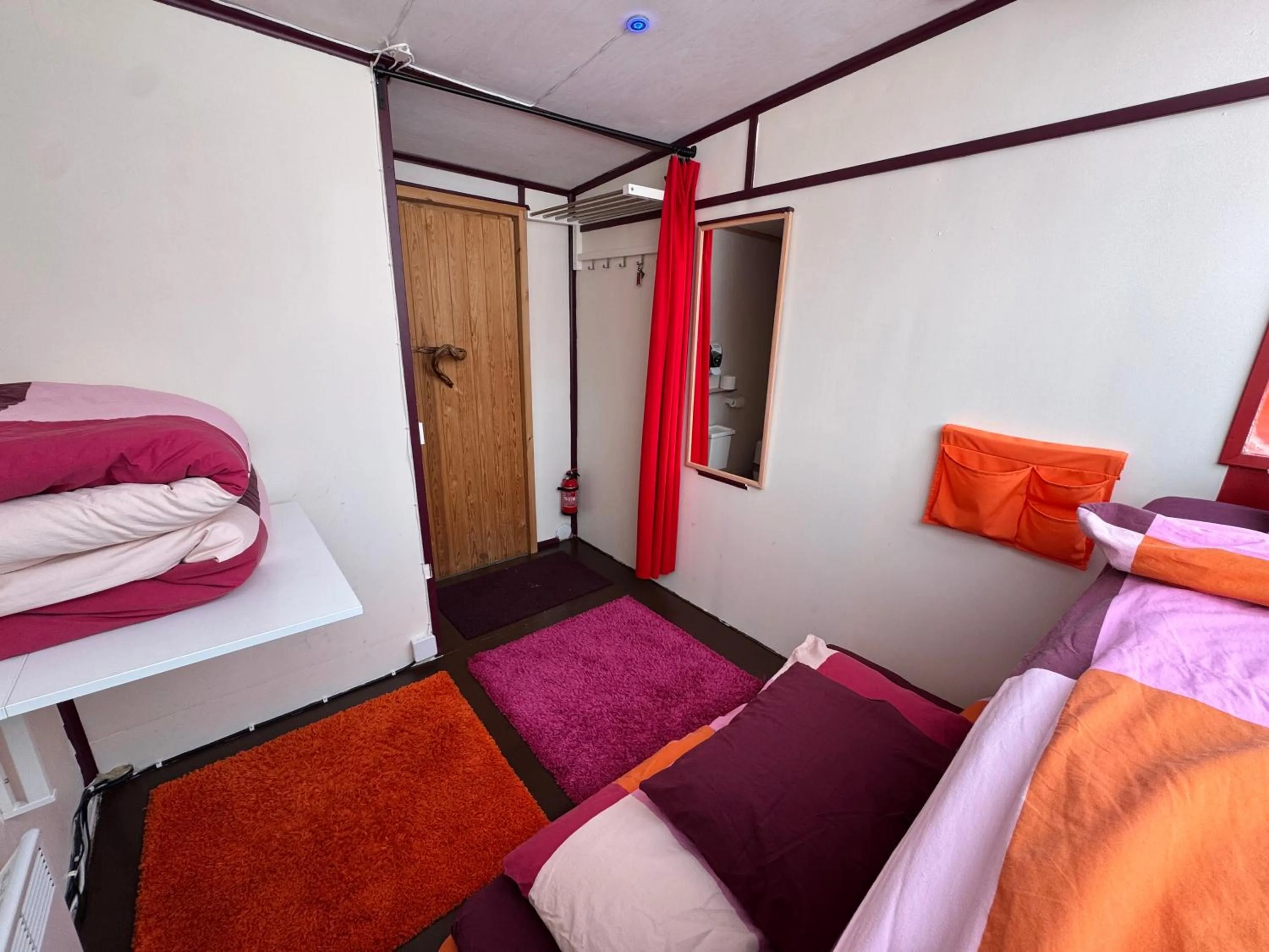 Bed in Lake Inari Mobile Cabins