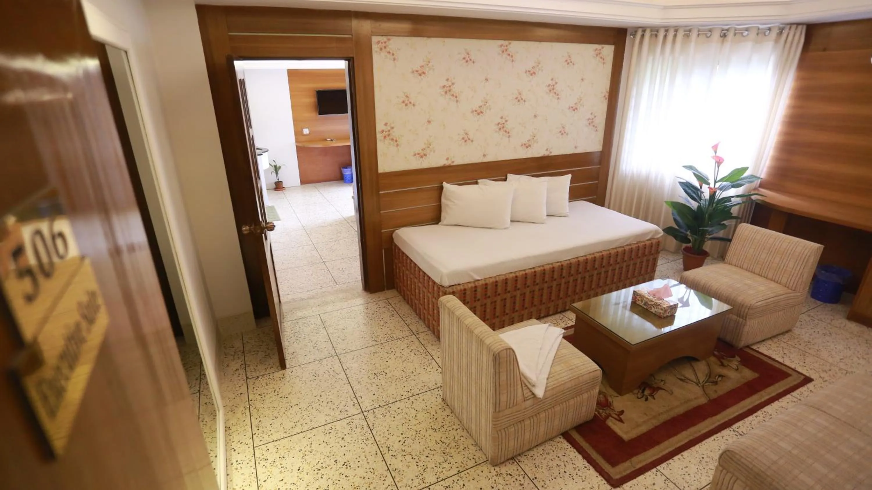 Communal lounge/ TV room, Bed in Nagar Valley Hotel Ltd.