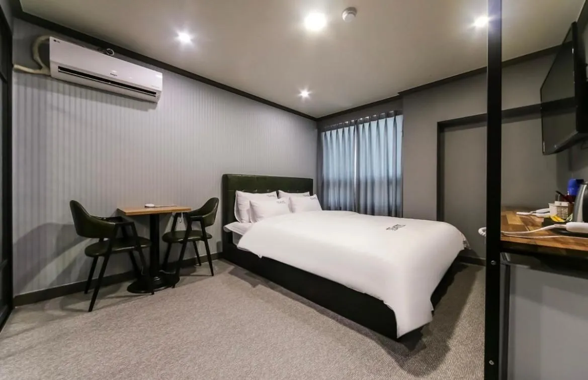 Bed in The Sharp Hotel