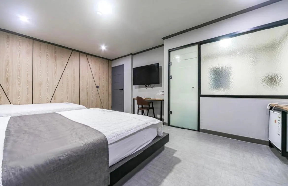 Bed in The Sharp Hotel