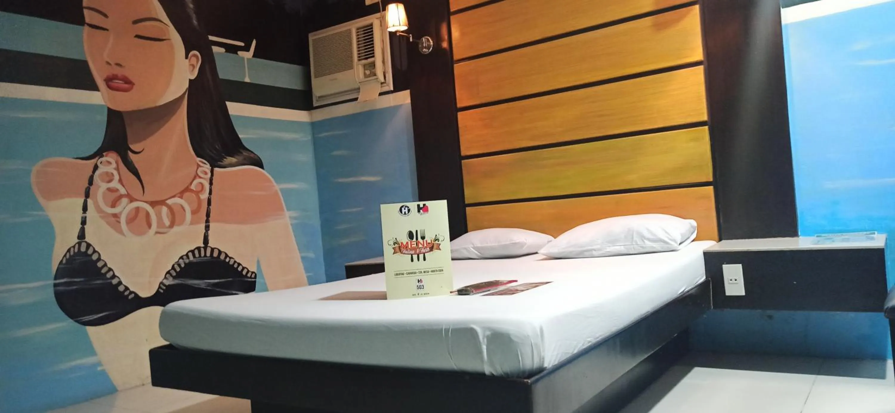 Bed in Harts Hotel-Quezon City