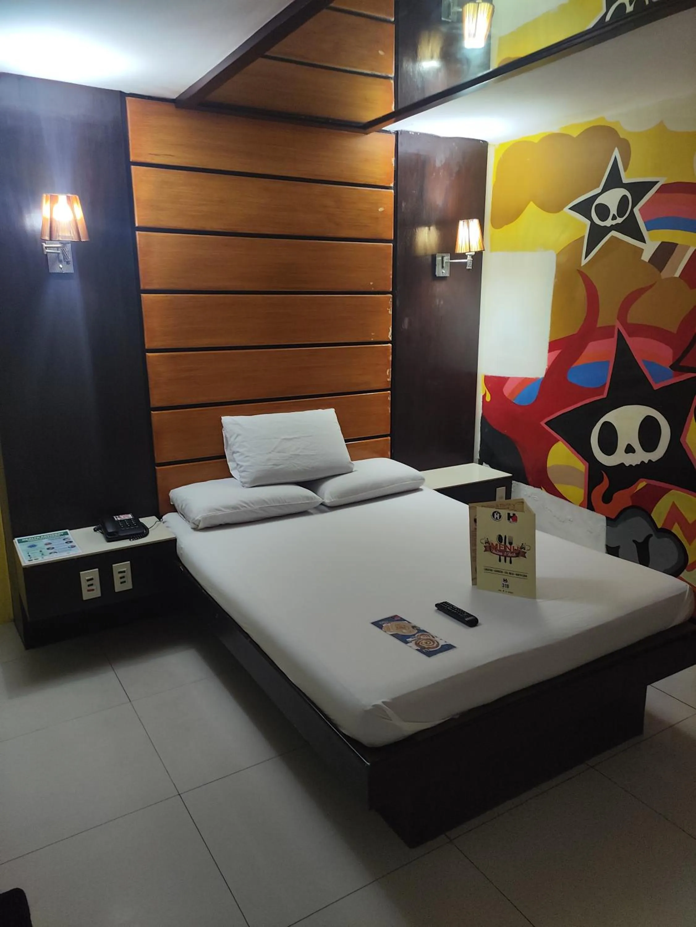 Bed in Harts Hotel-Quezon City