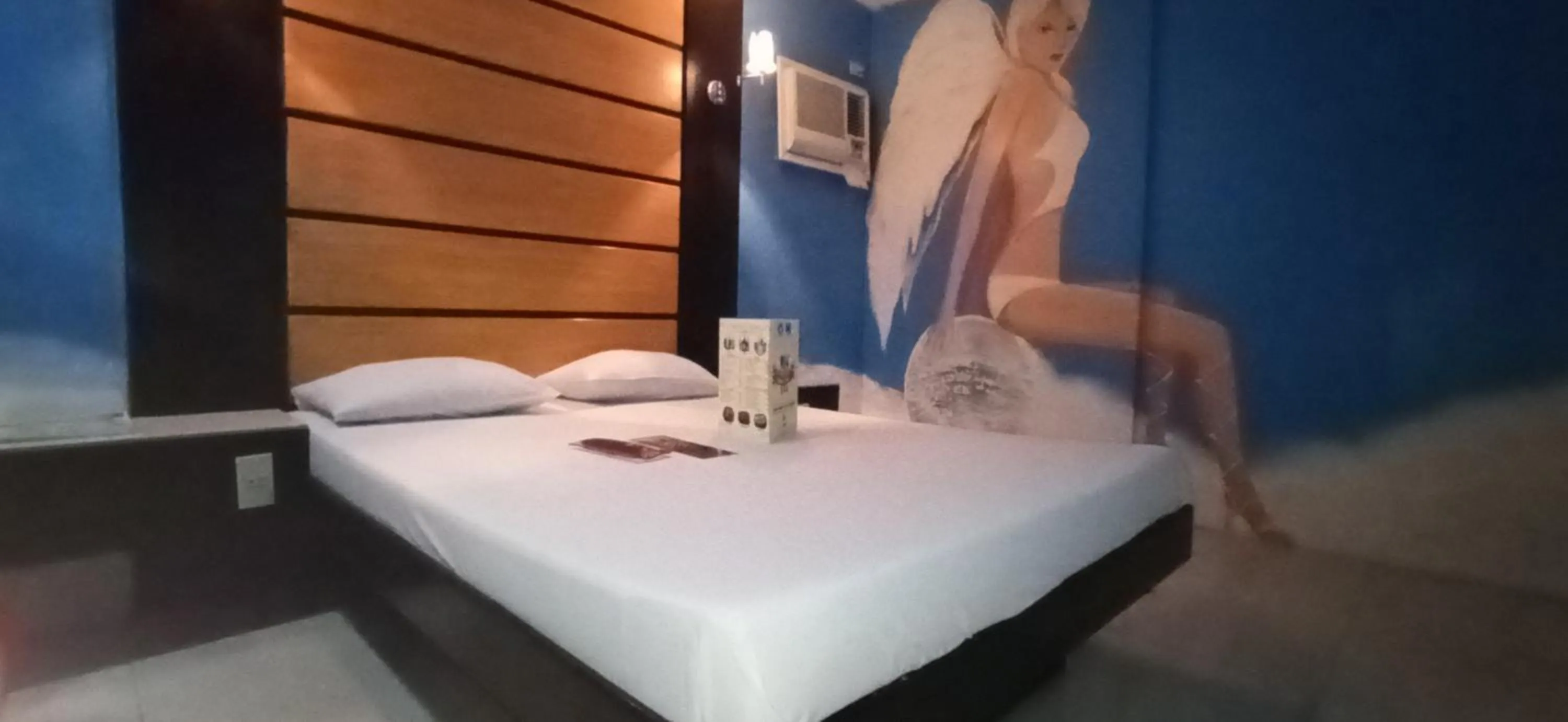 Bed in Harts Hotel-Quezon City