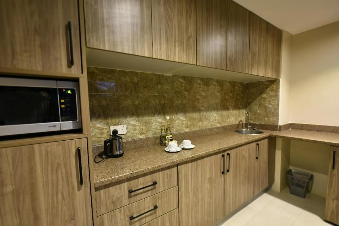 Kitchen or kitchenette in Arcadia Suites - Kampala