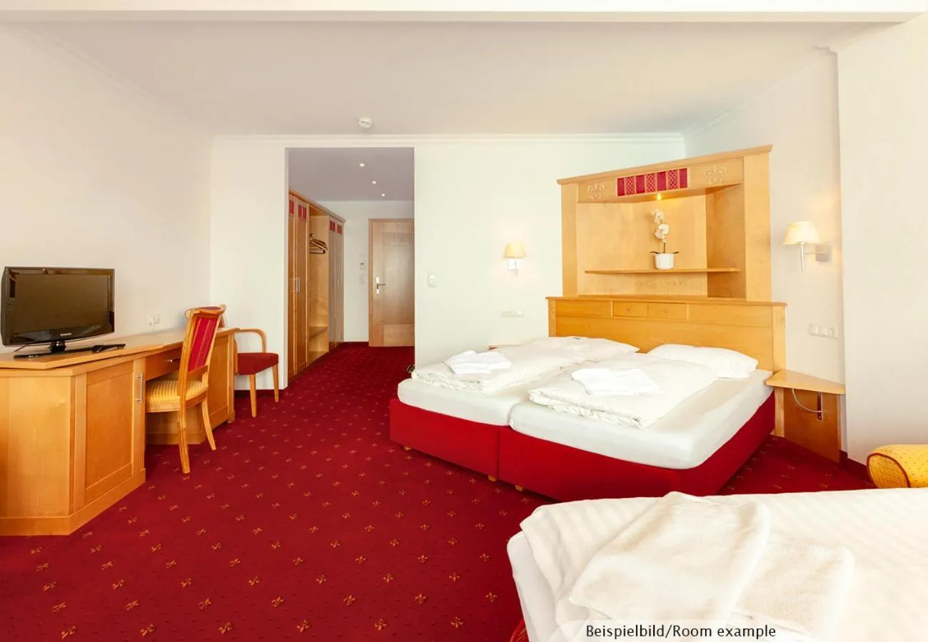 Photo of the whole room, Bed in Sporthotel Christophorus