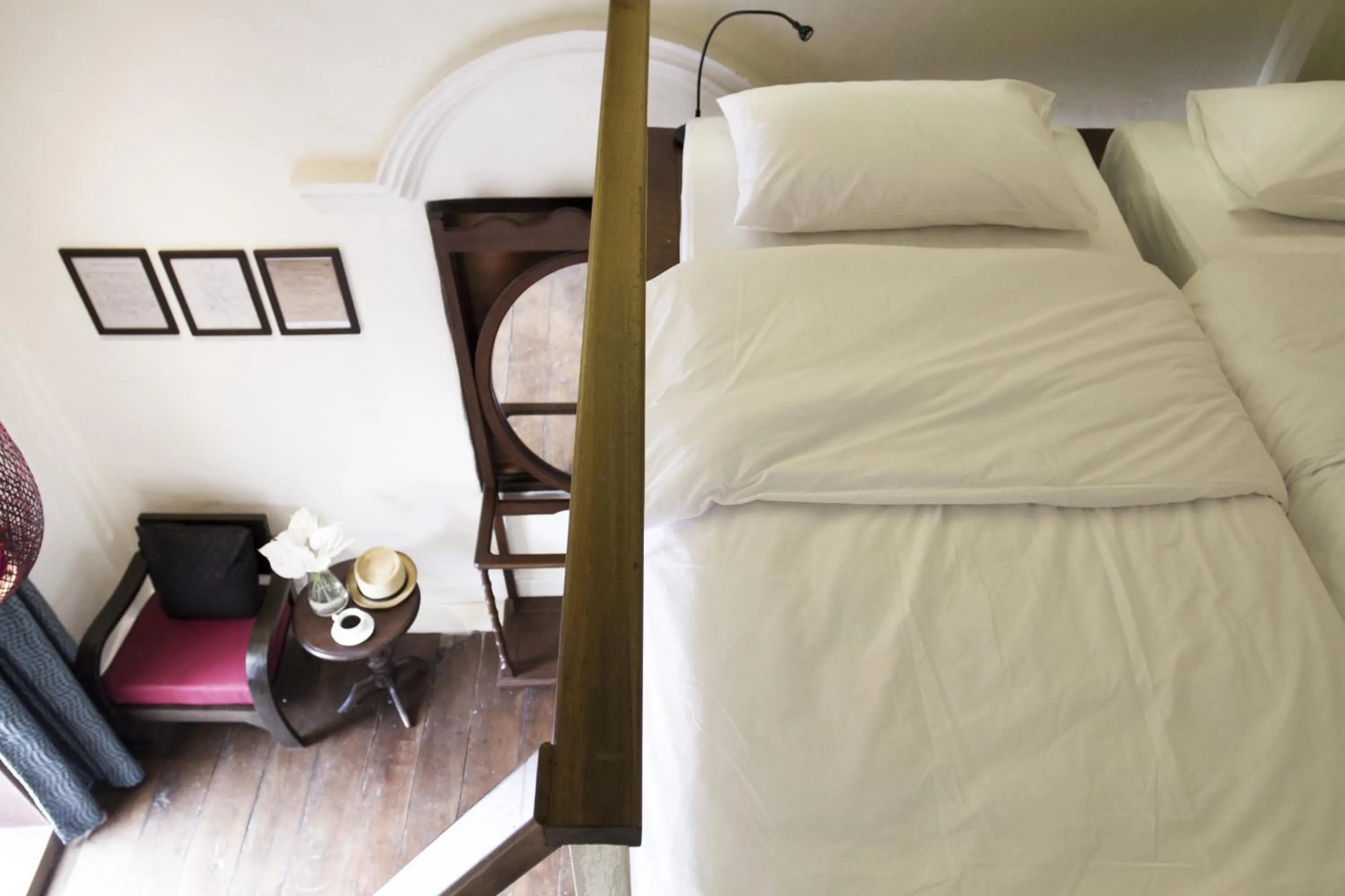 Bed in Baan Luang Rajamaitri Historic Inn