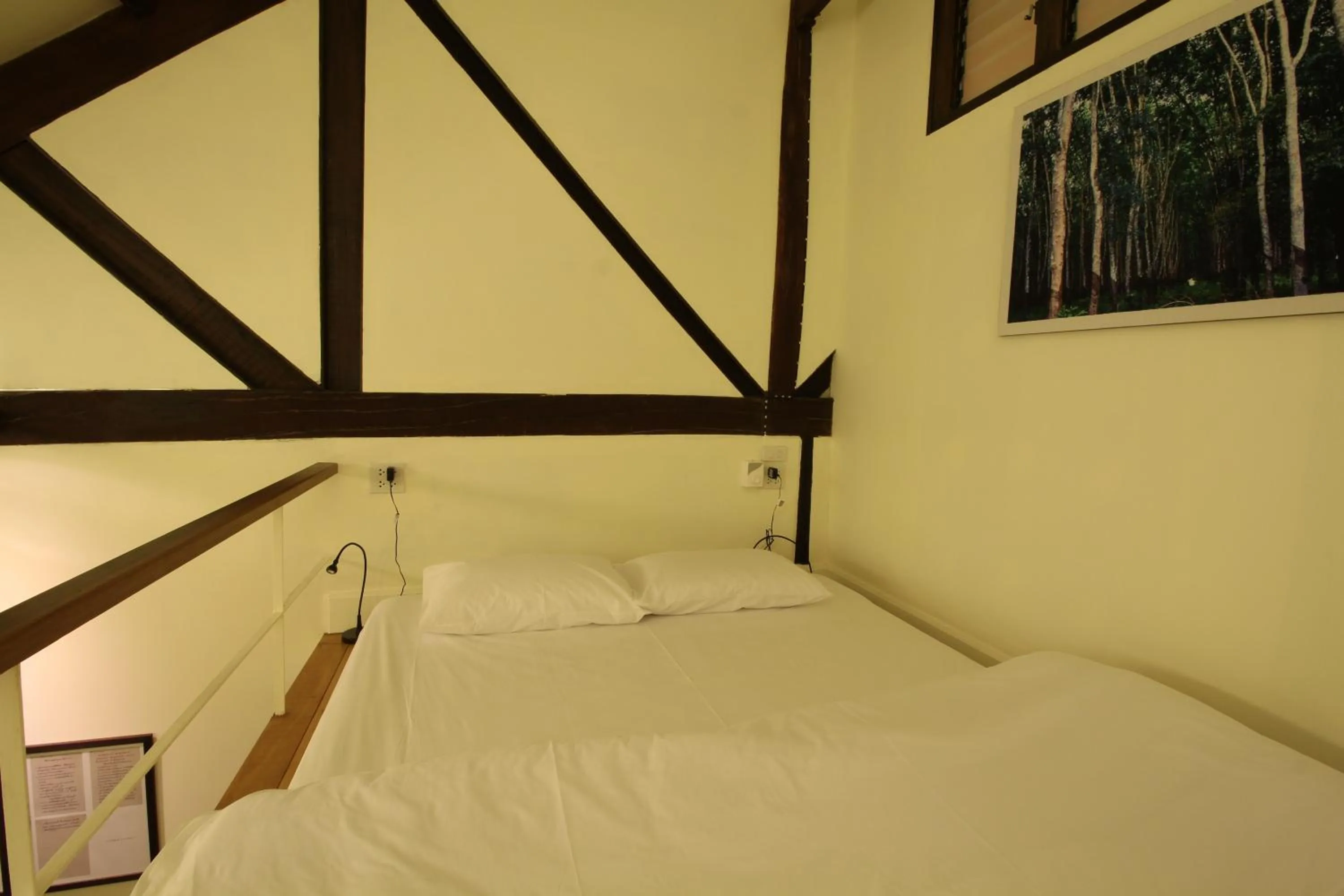 Bed in Baan Luang Rajamaitri Historic Inn