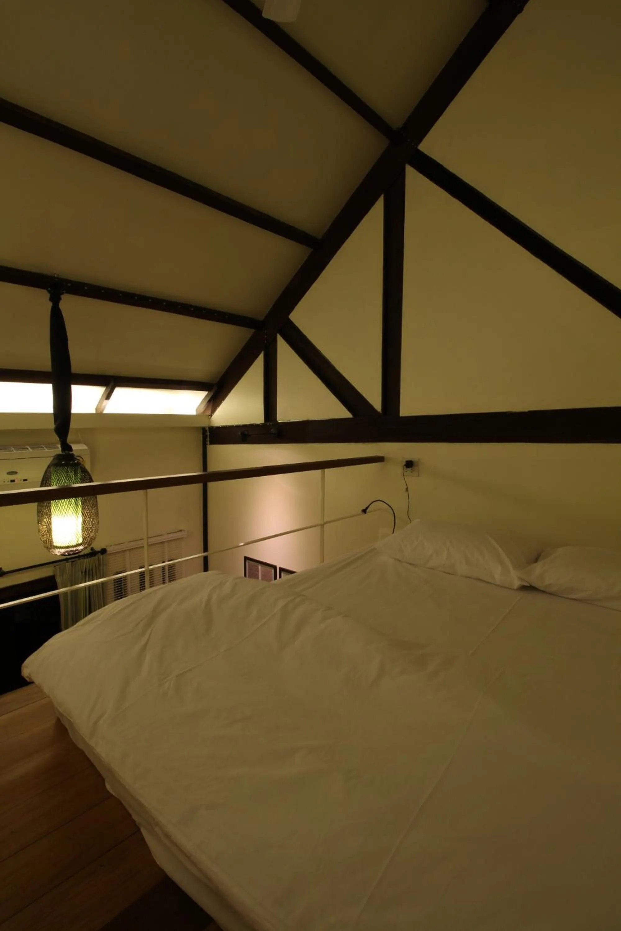 Bed in Baan Luang Rajamaitri Historic Inn