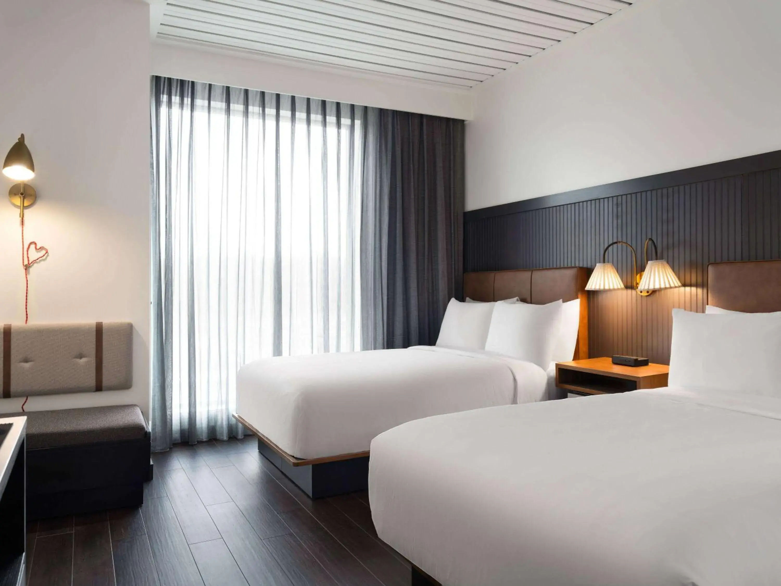 Queen Room with Two Queen Beds and Roll-In Shower - Mobility Accessible in Origin Kansas City Riverfront, a Wyndham Hotel Queen Room with Two Queen Beds and Roll-In Shower - Mobility Accessible in Origin Kansas City Riverfront, a Wyndham Hotel