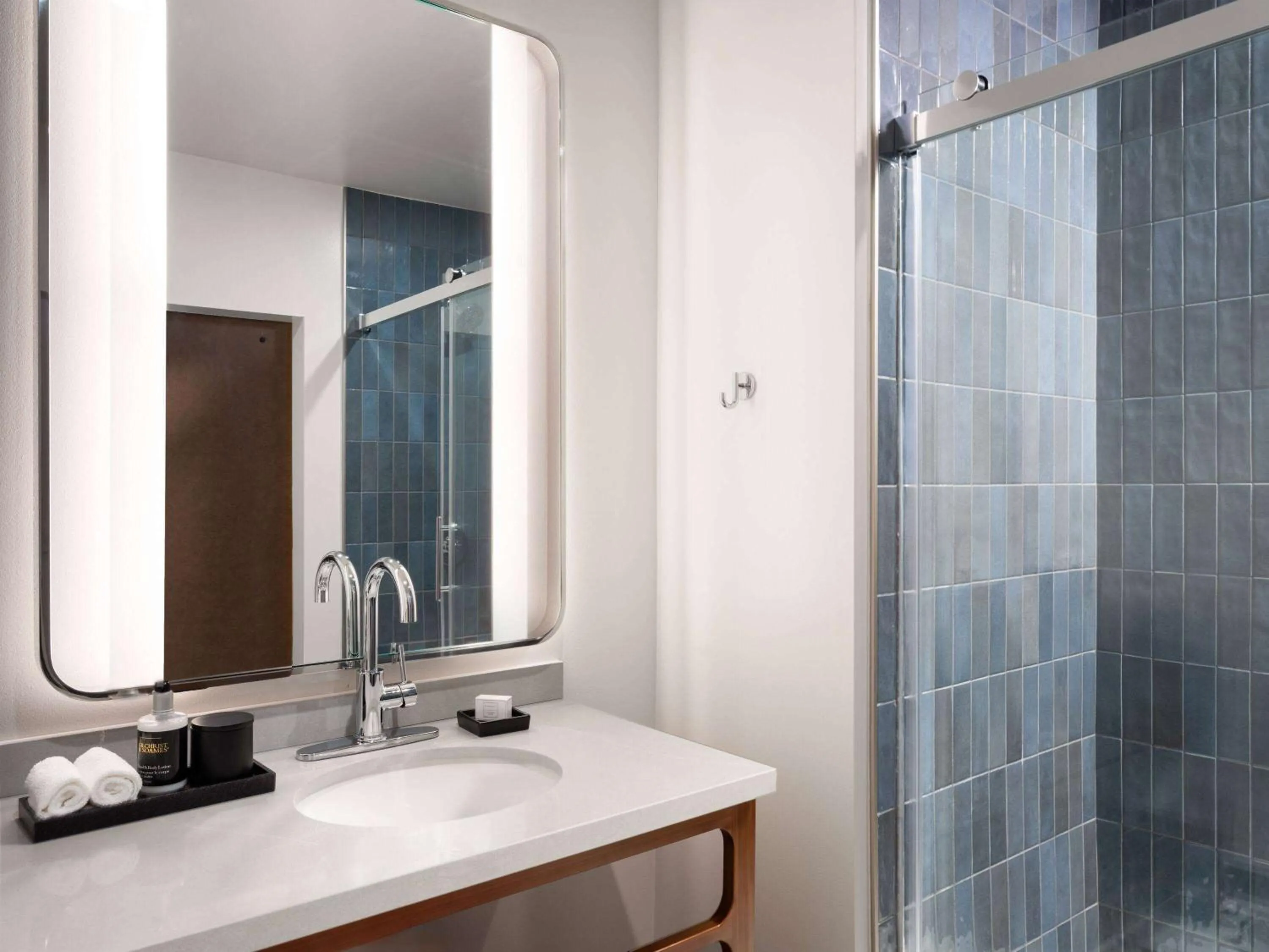 Bathroom in Origin Kansas City Riverfront, a Wyndham Hotel