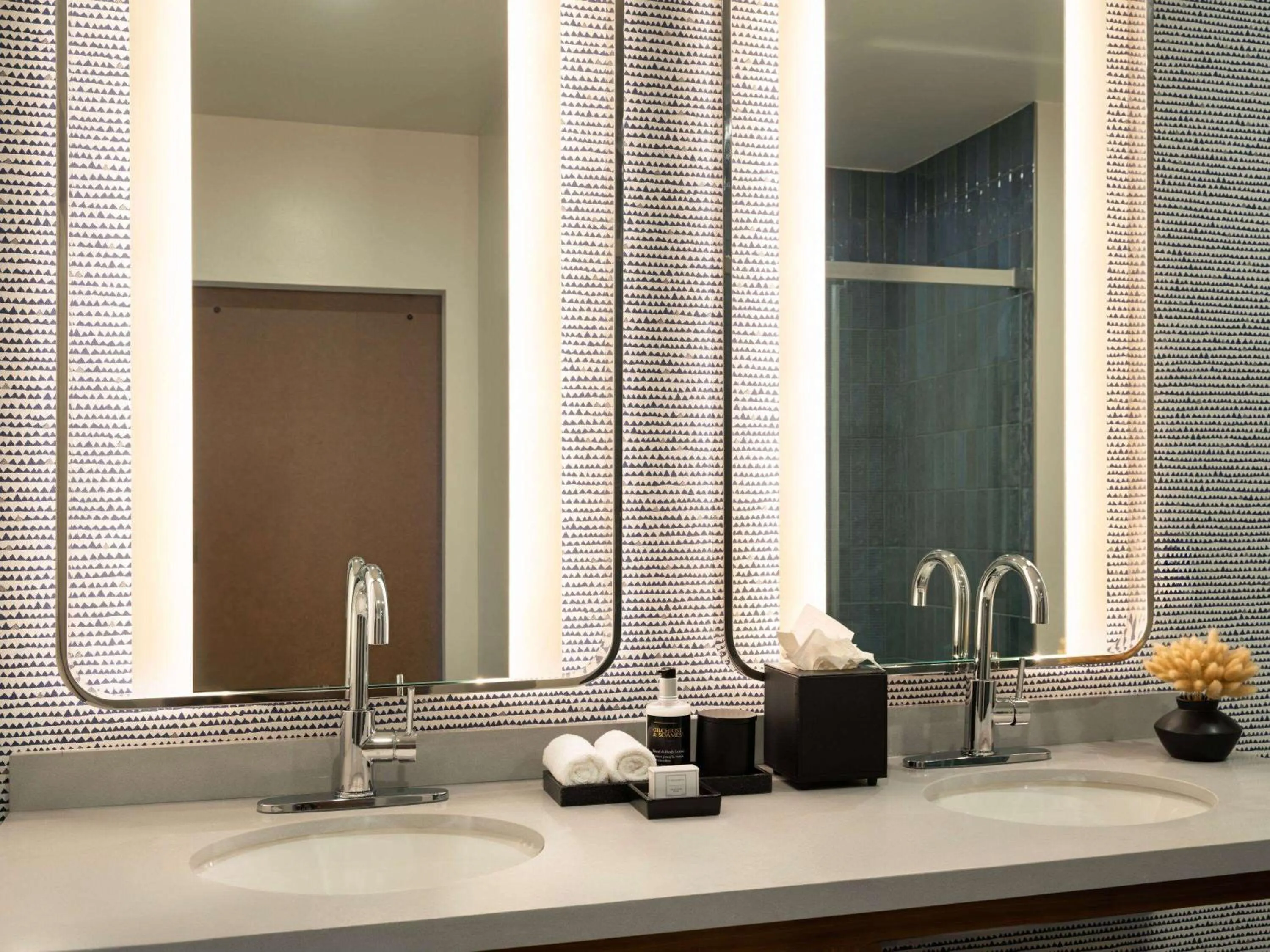 Bathroom in Origin Kansas City Riverfront, a Wyndham Hotel