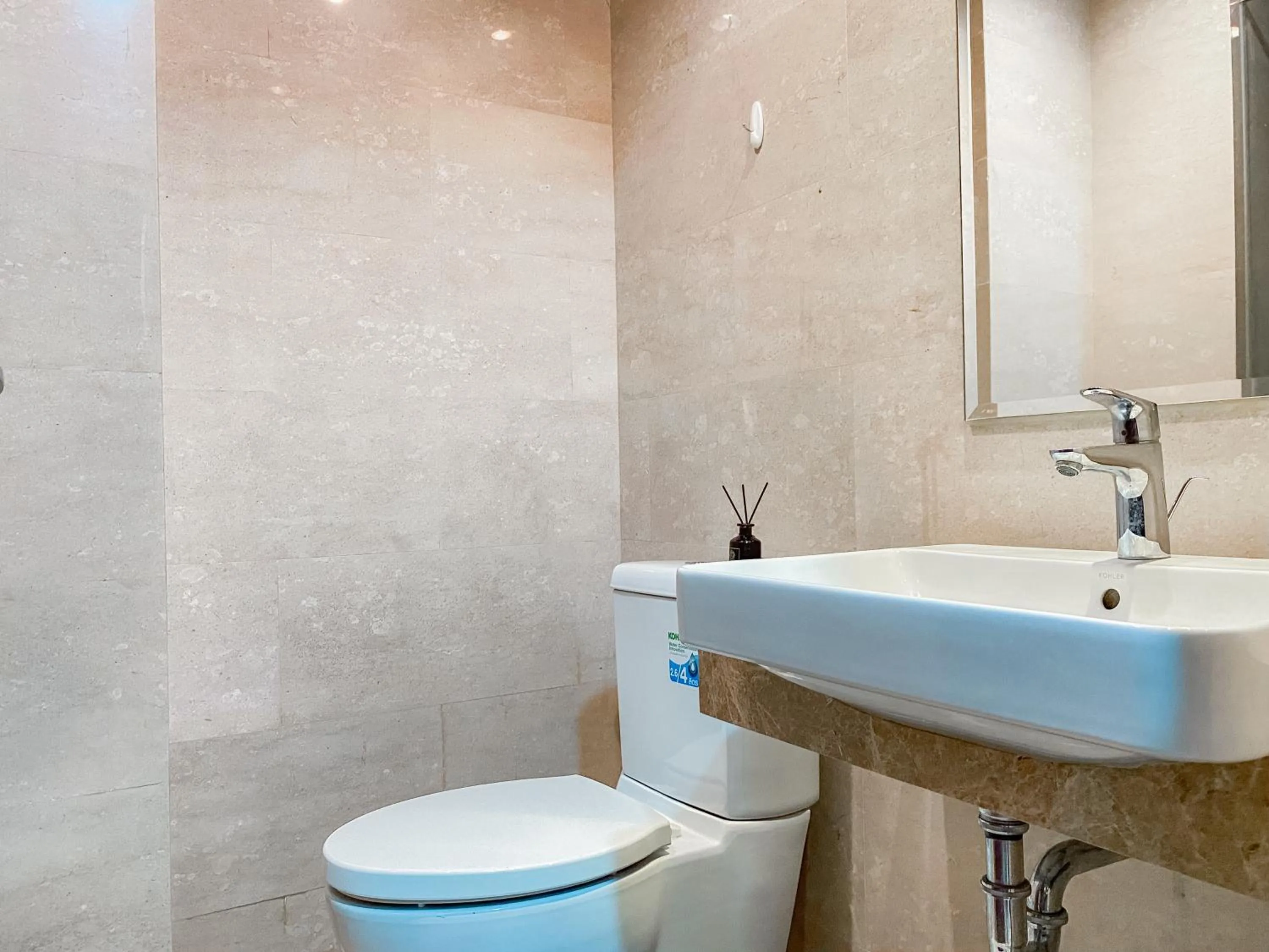 Bathroom in Lovely Studio Menteng Park Apartment By Travelio