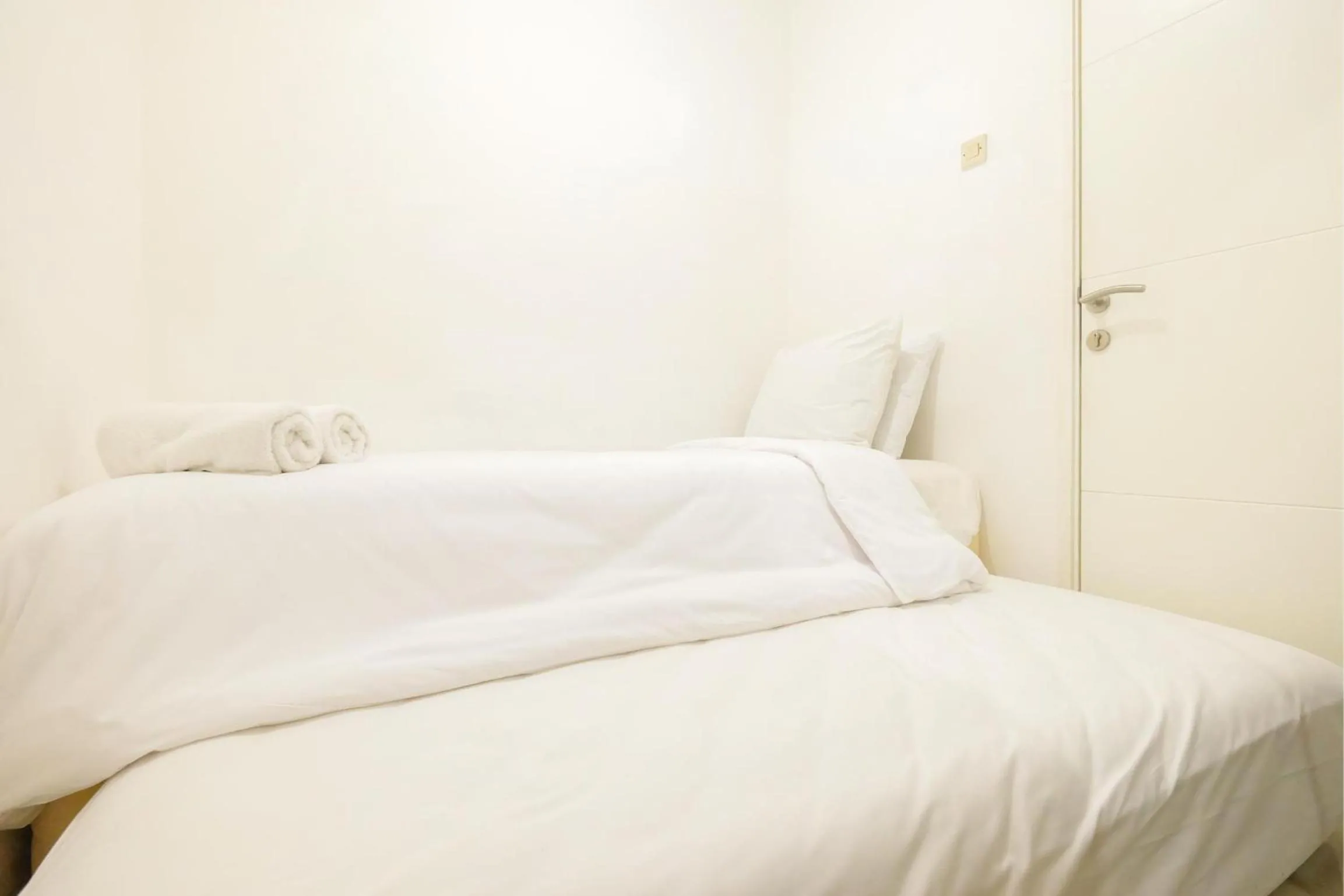 City View 2BR at Bassura City Apartment By Travelio