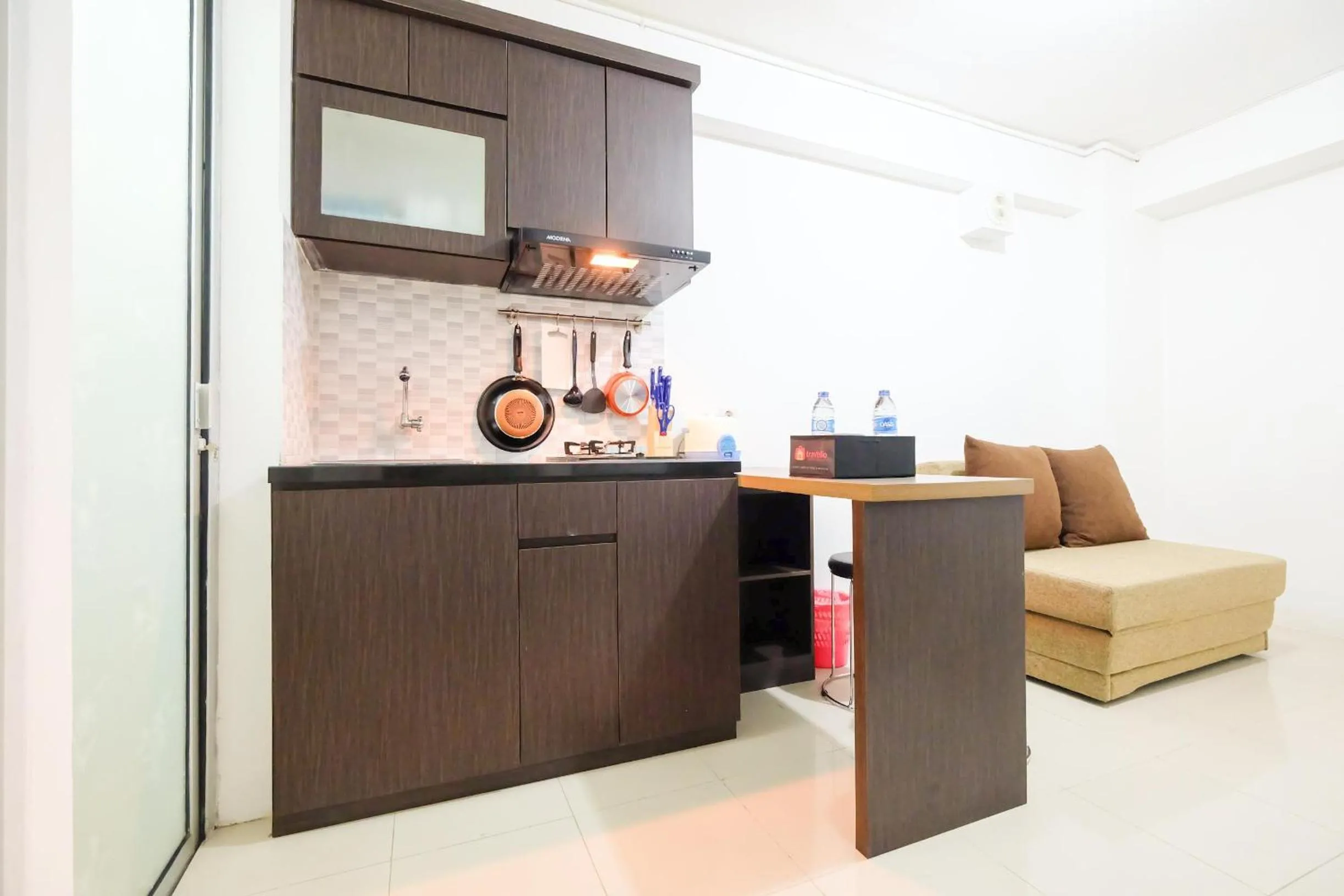 City View 2BR at Bassura City Apartment By Travelio