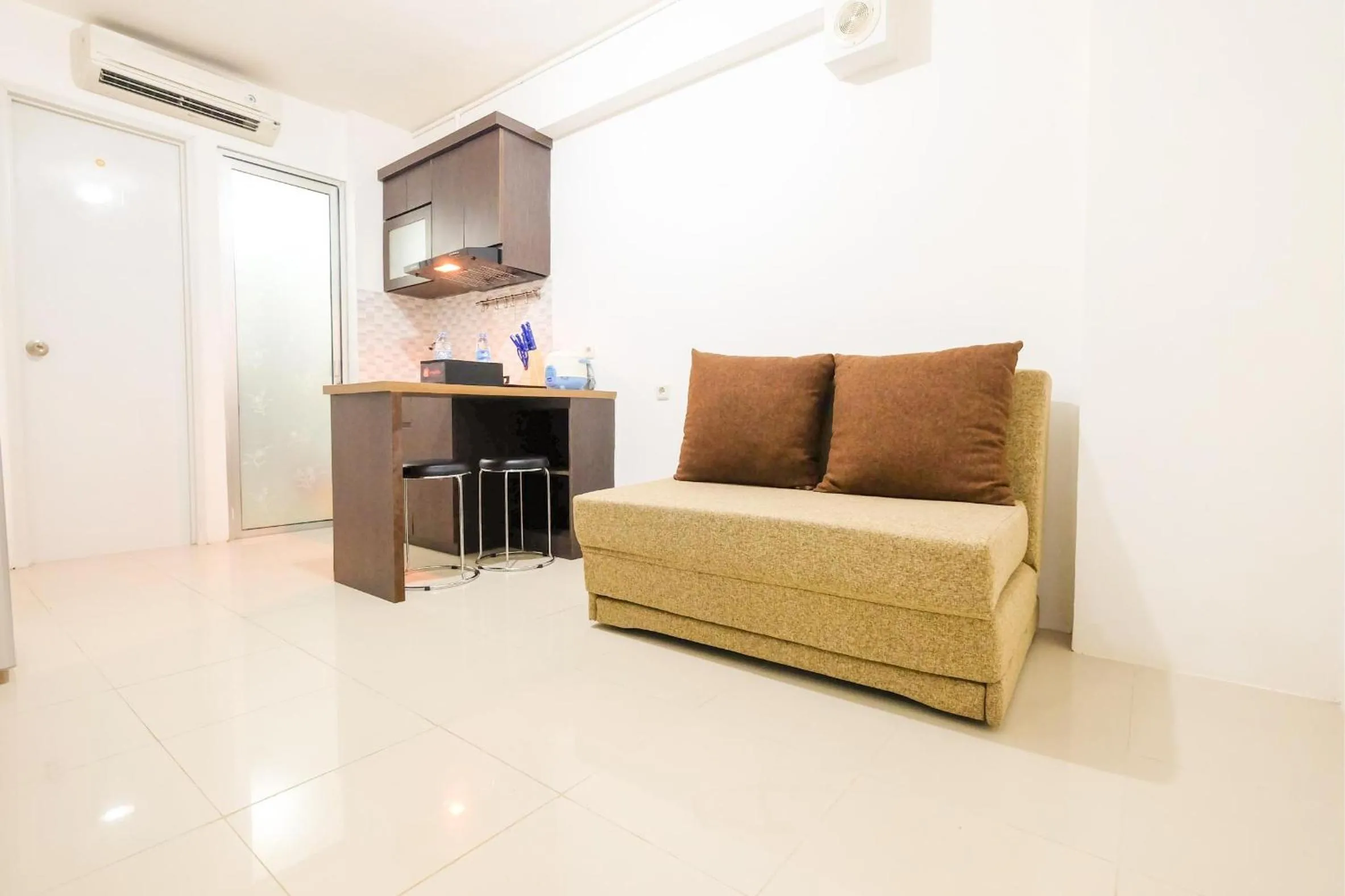 City View 2BR at Bassura City Apartment By Travelio