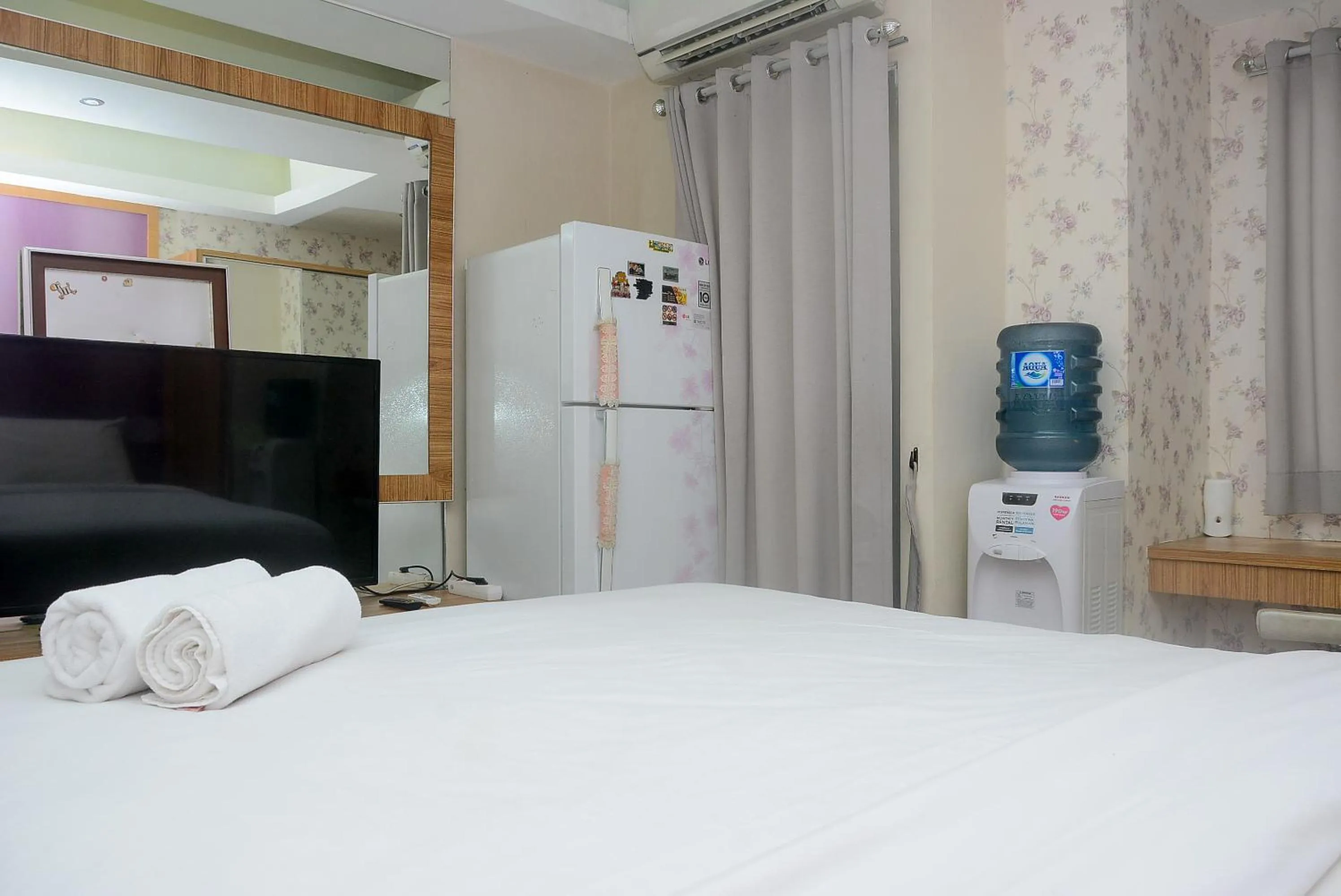 Bed in Homey Studio Pakubuwono Terrace Apartment By Travelio