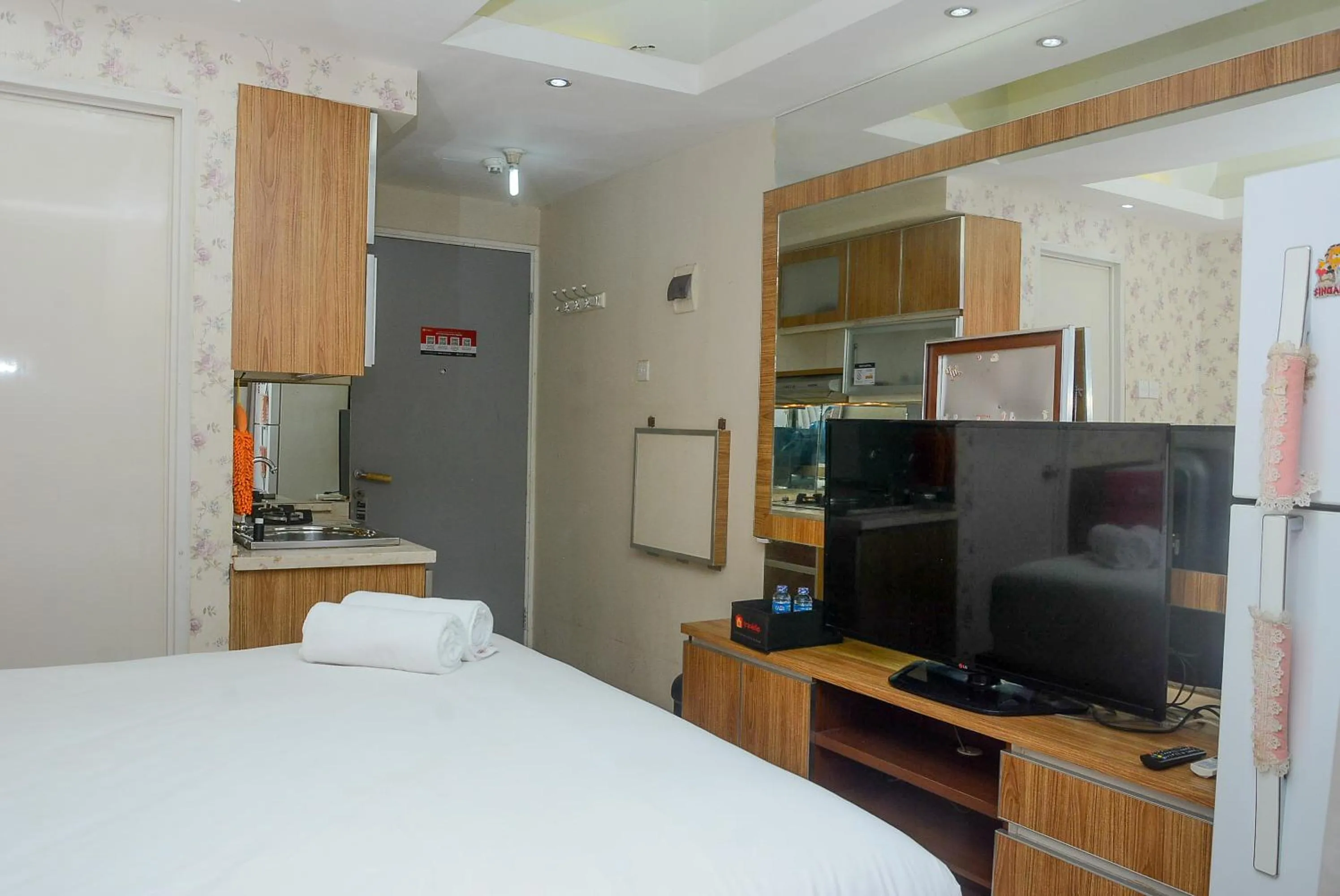 Bed in Homey Studio Pakubuwono Terrace Apartment By Travelio