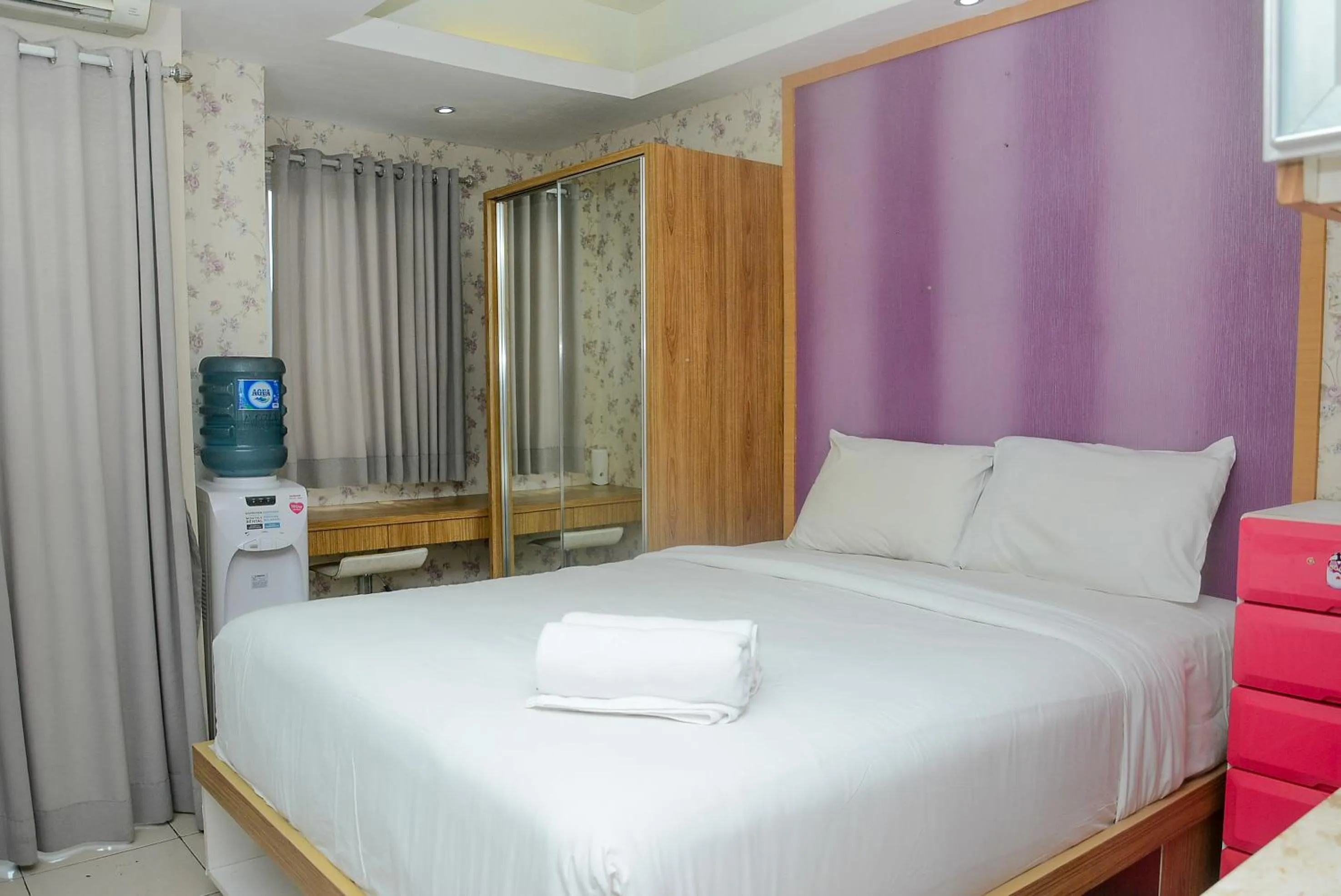 Bed in Homey Studio Pakubuwono Terrace Apartment By Travelio