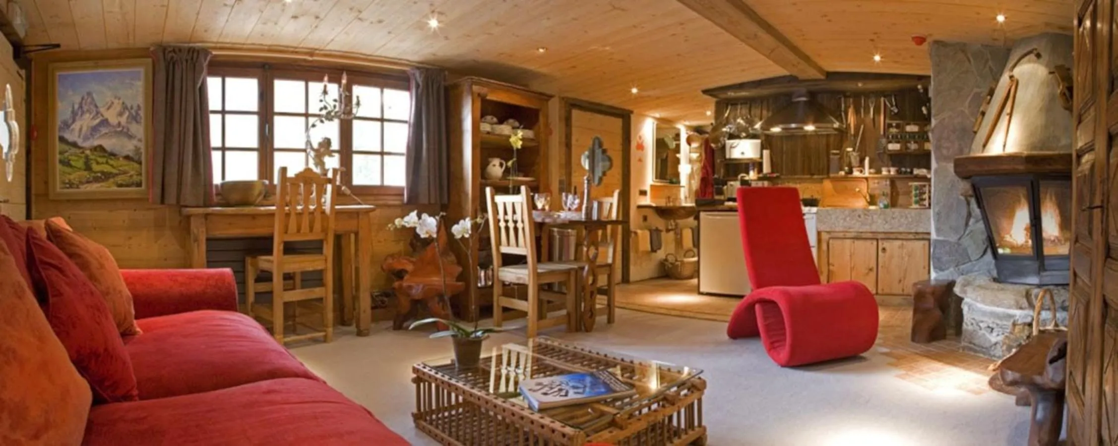 Living room in Hôtel Les Chalets de Philippe avec Jacuzzis Privatifs