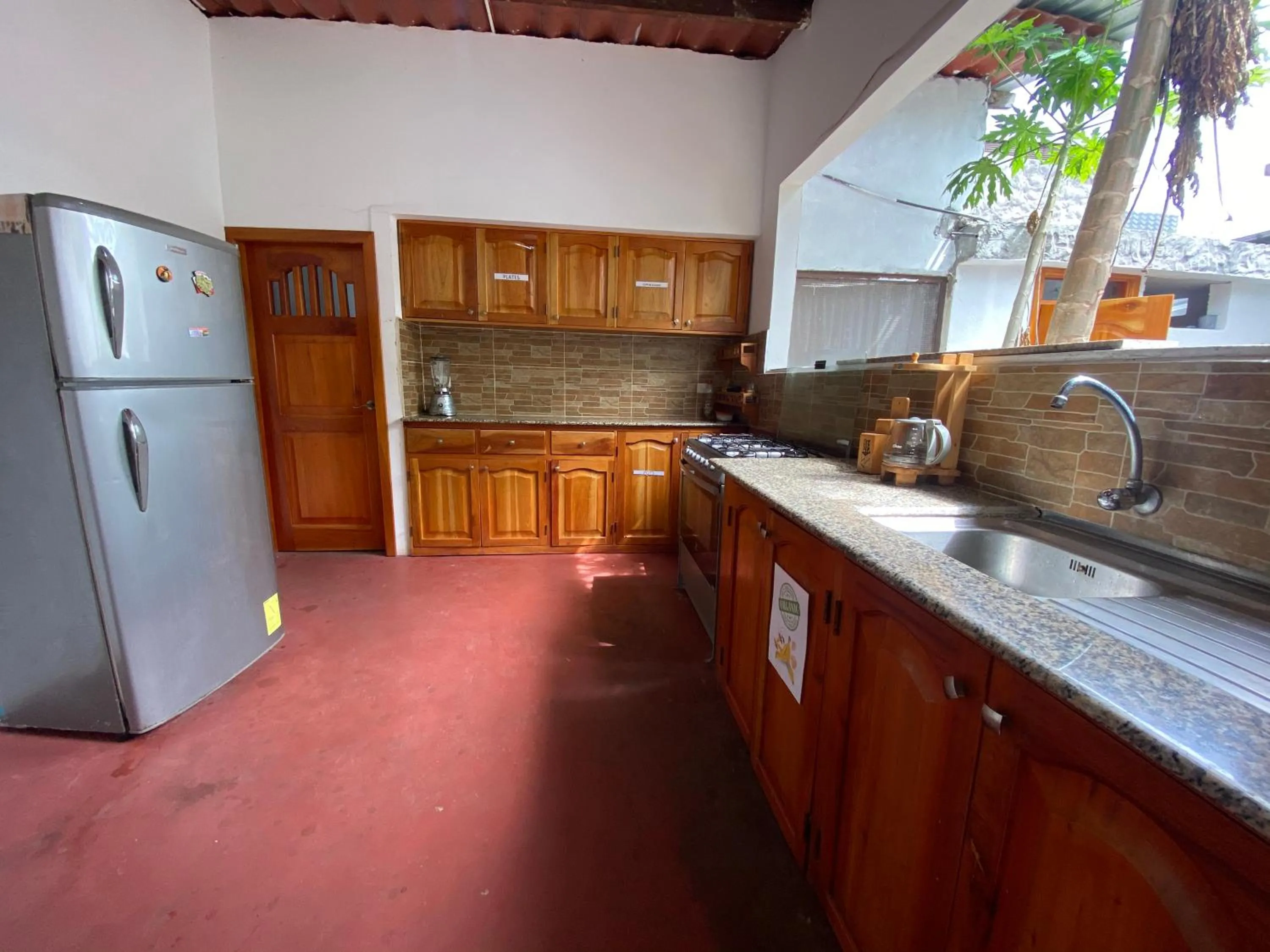 Kitchen or kitchenette in Hostal Vista al Mar