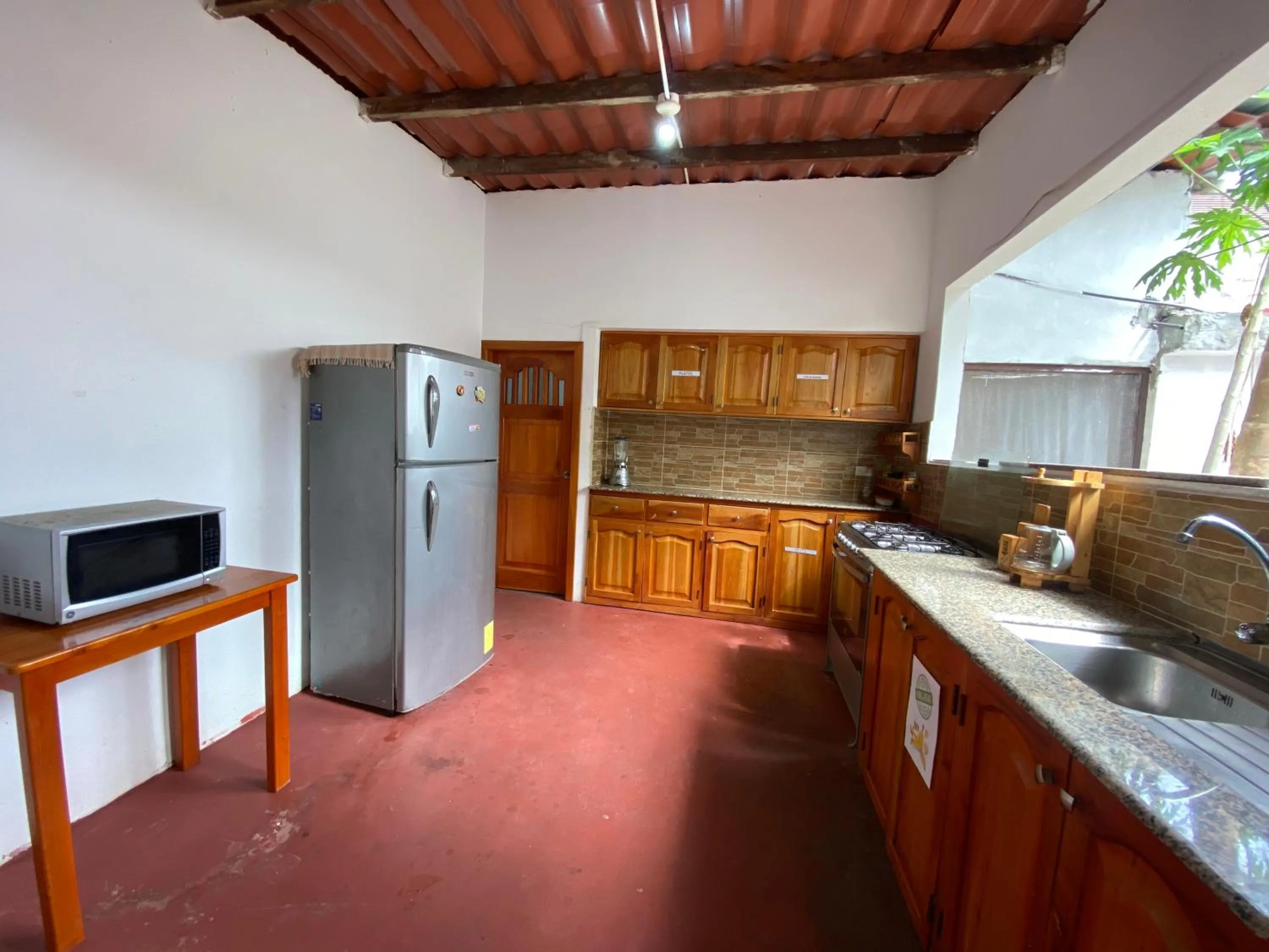 Kitchen or kitchenette in Hostal Vista al Mar