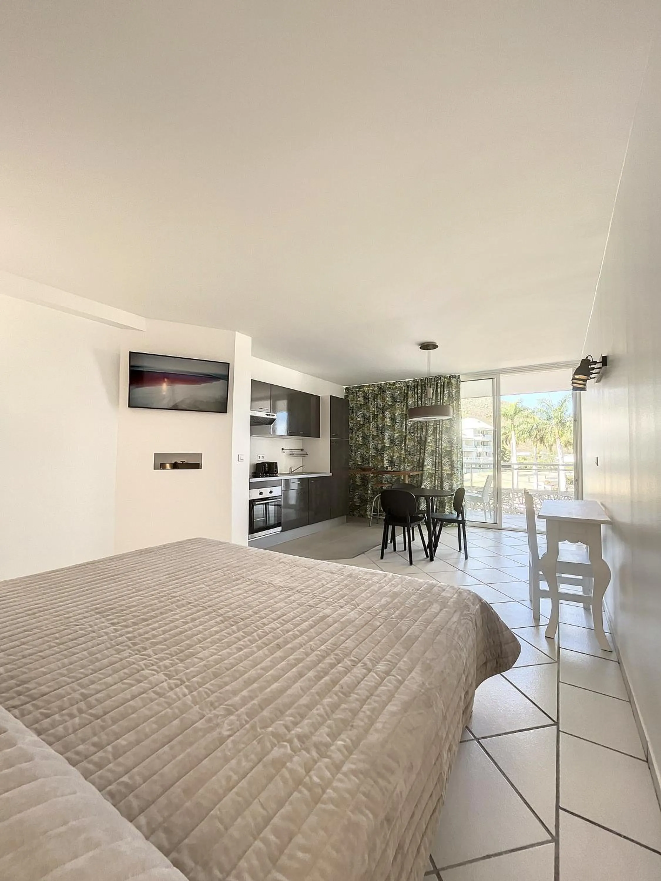 Photo of the whole room, Bed in Le Domaine Anse Marcel Beach Resort