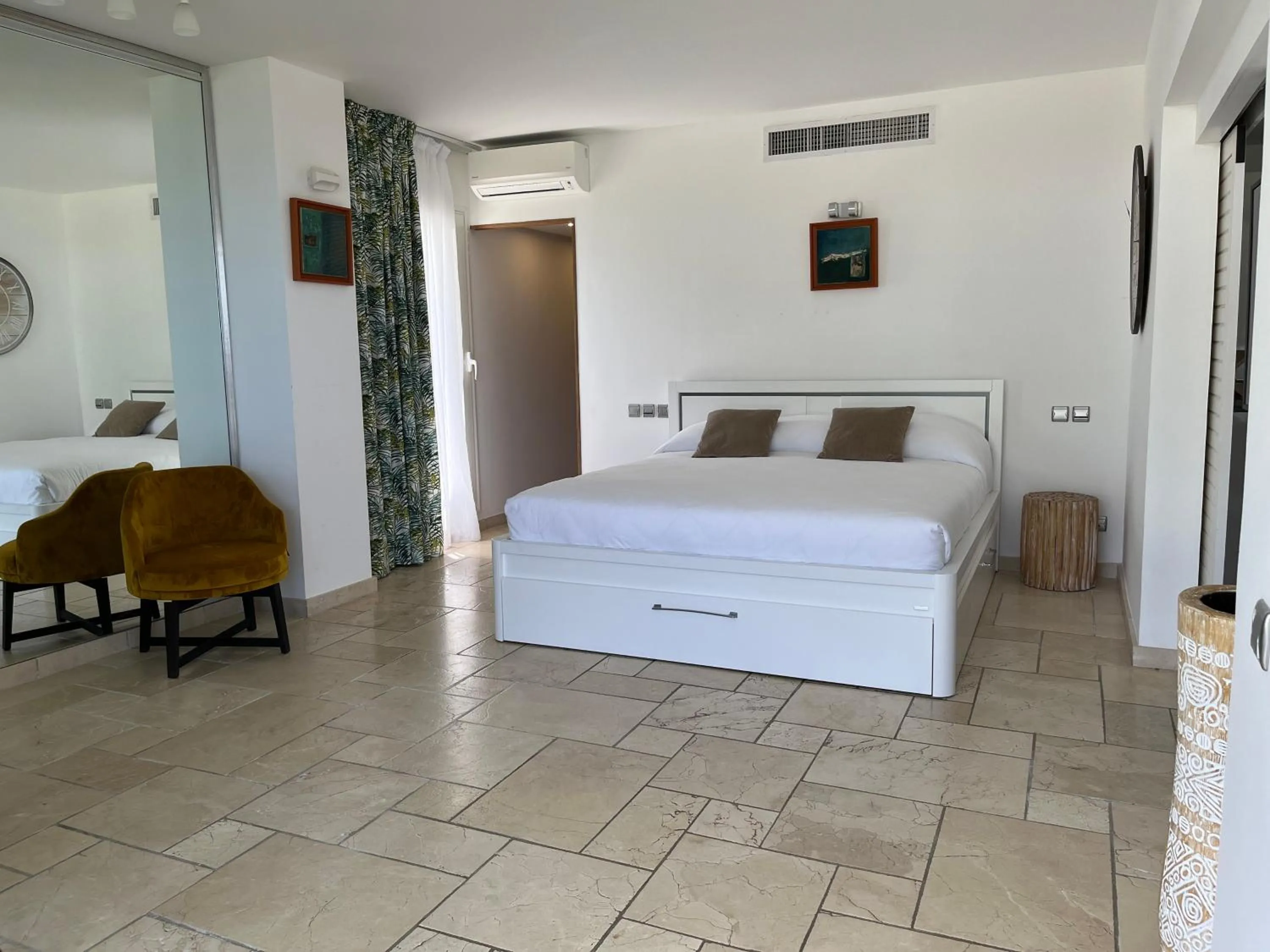 Bed in Le Domaine Anse Marcel Beach Resort