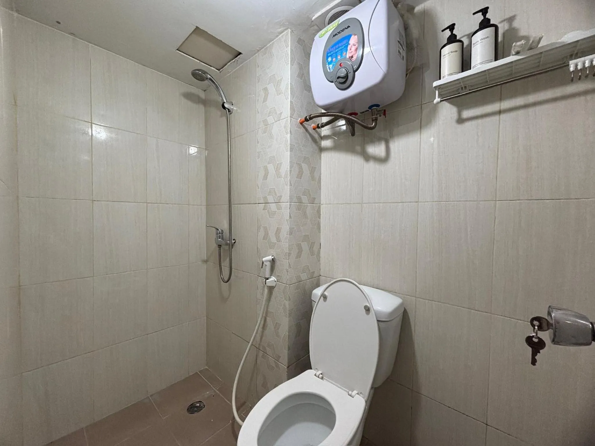 Shower in The Jarrdin Apartment Hotels by Ironman